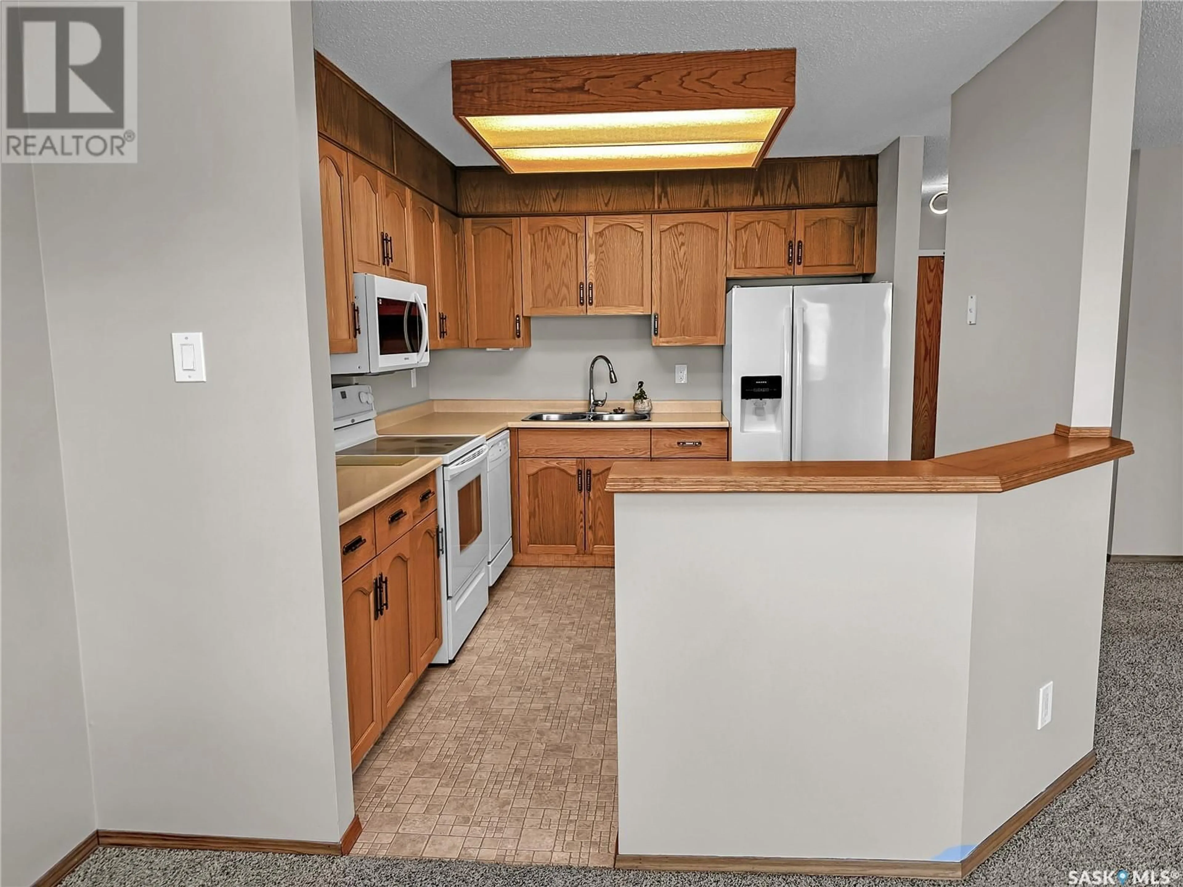 Standard kitchen, unknown for 306 - 1442 102ND STREET, North Battleford Saskatchewan S9A1G7
