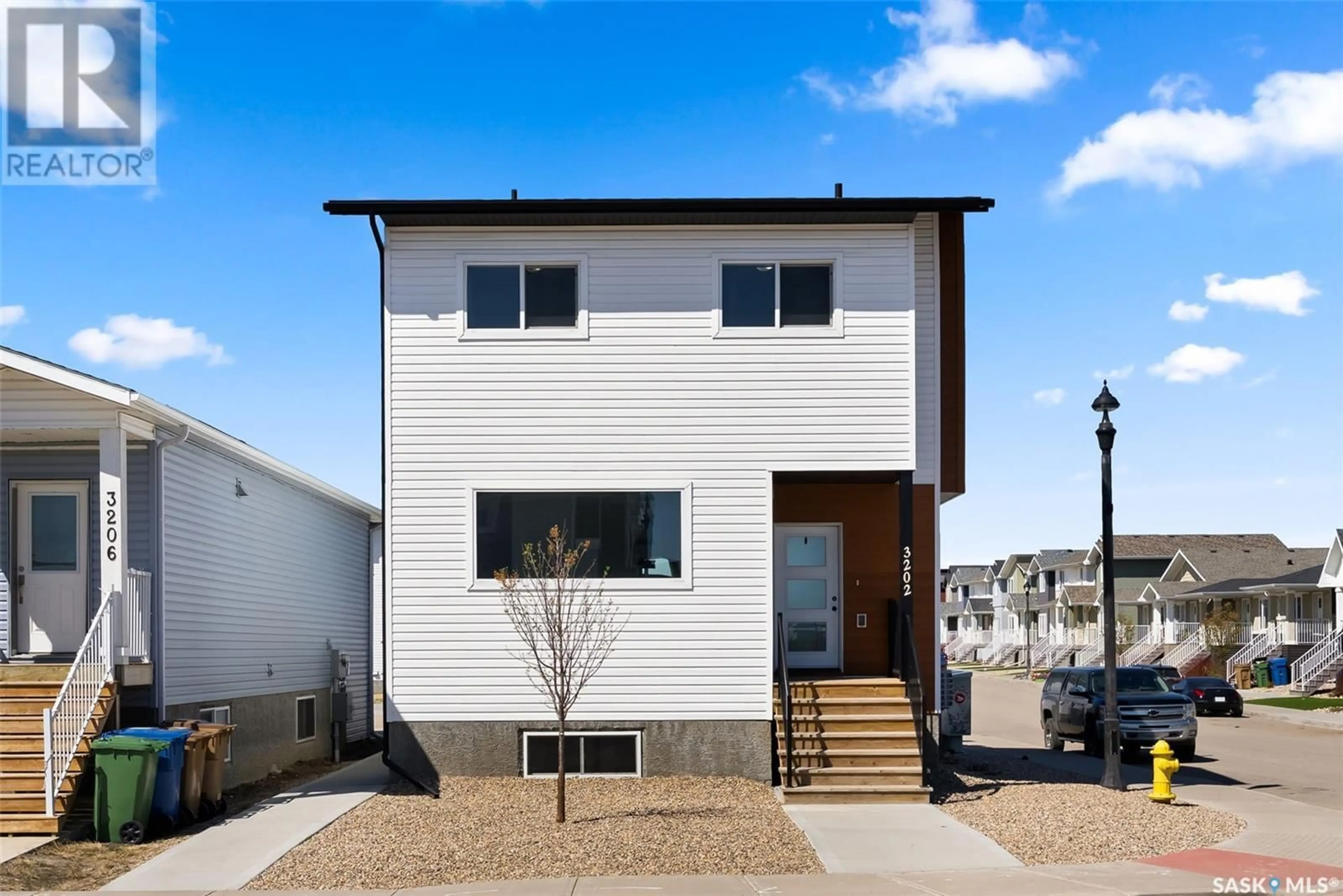 Home with vinyl exterior material, street for 3202 GREEN BROOK ROAD, Regina Saskatchewan S4V3R2