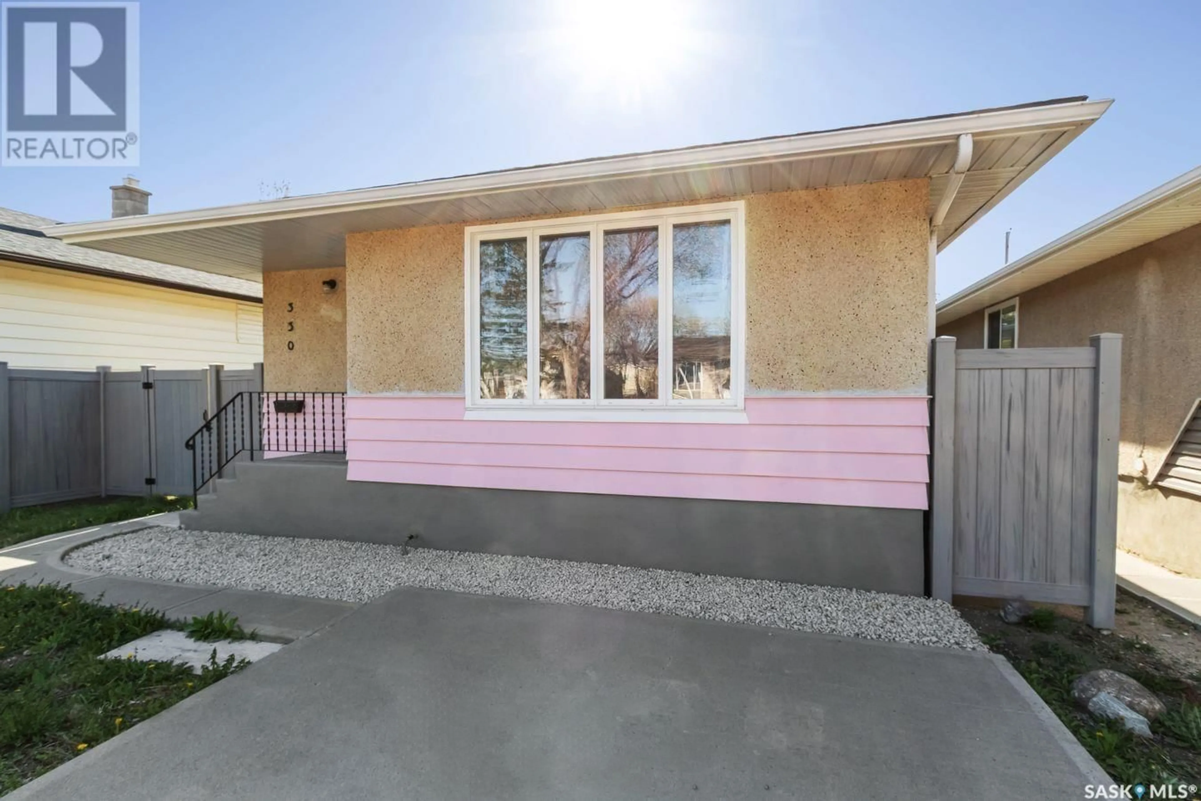 Home with vinyl exterior material, street for 330 ST JOHN STREET, Regina Saskatchewan S4R1R2