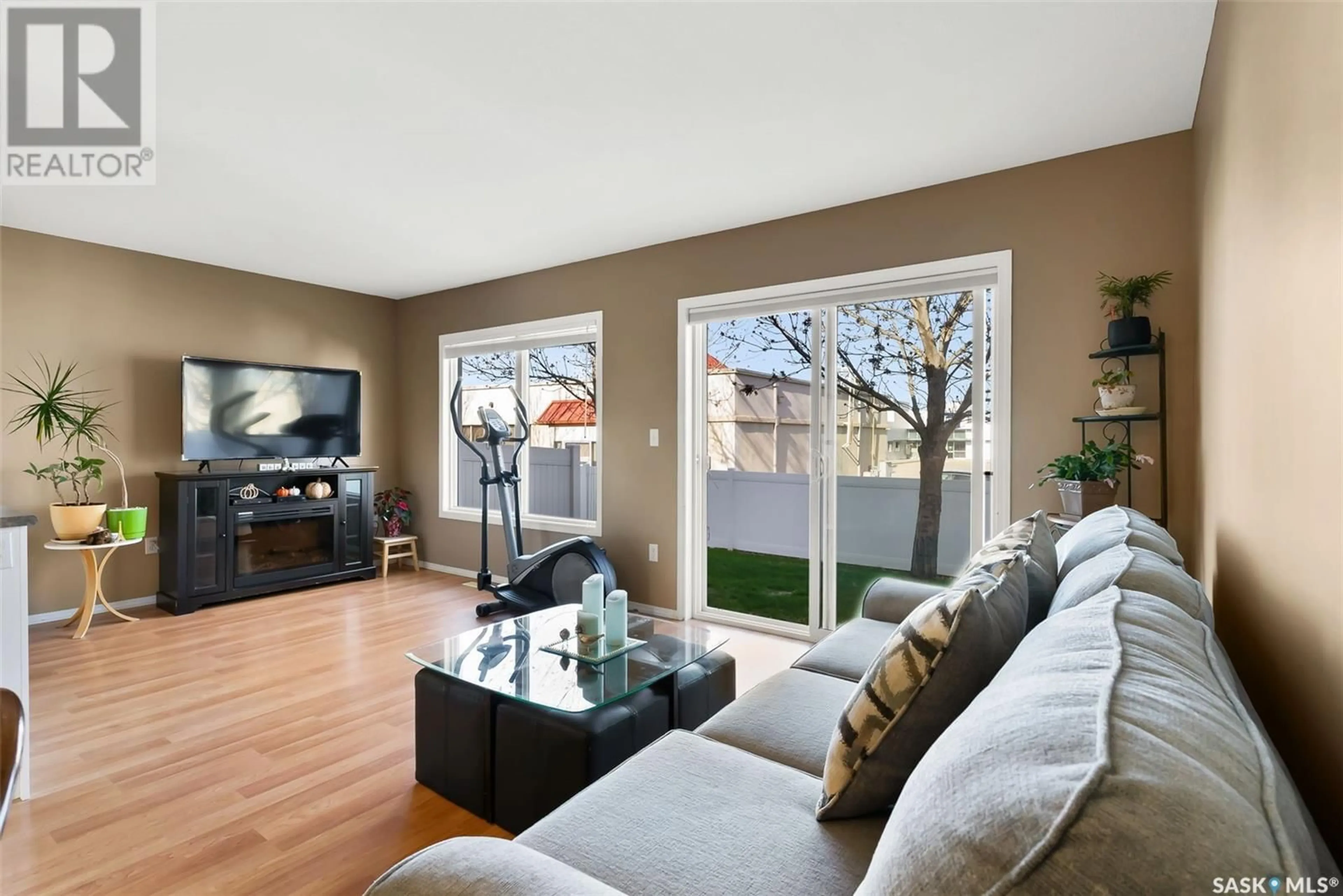Living room with furniture, wood/laminate floor for 4614 MARIGOLD DRIVE, Regina Saskatchewan S4X4S5