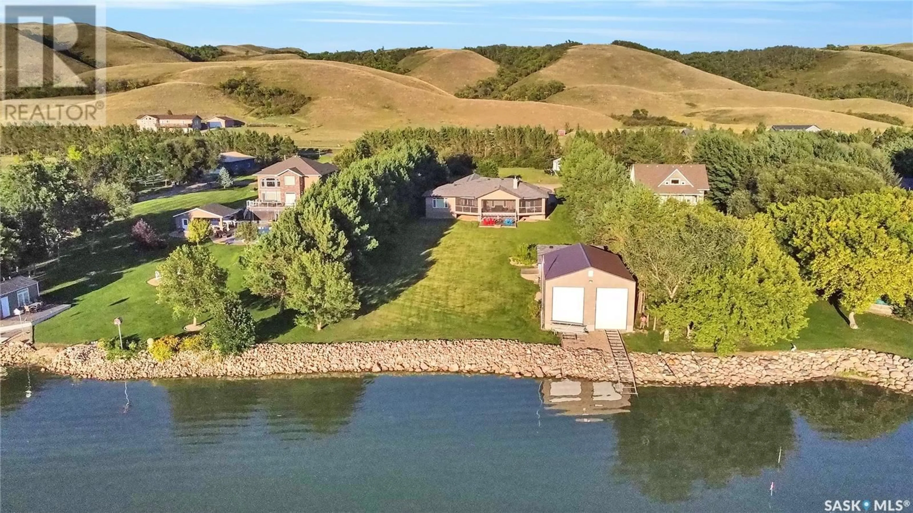 A pic from outside/outdoor area/front of a property/back of a property/a pic from drone, water/lake/river/ocean view for 215-217 NORTH SHORE DRIVE, Buffalo Pound Lake Saskatchewan S0H4C0