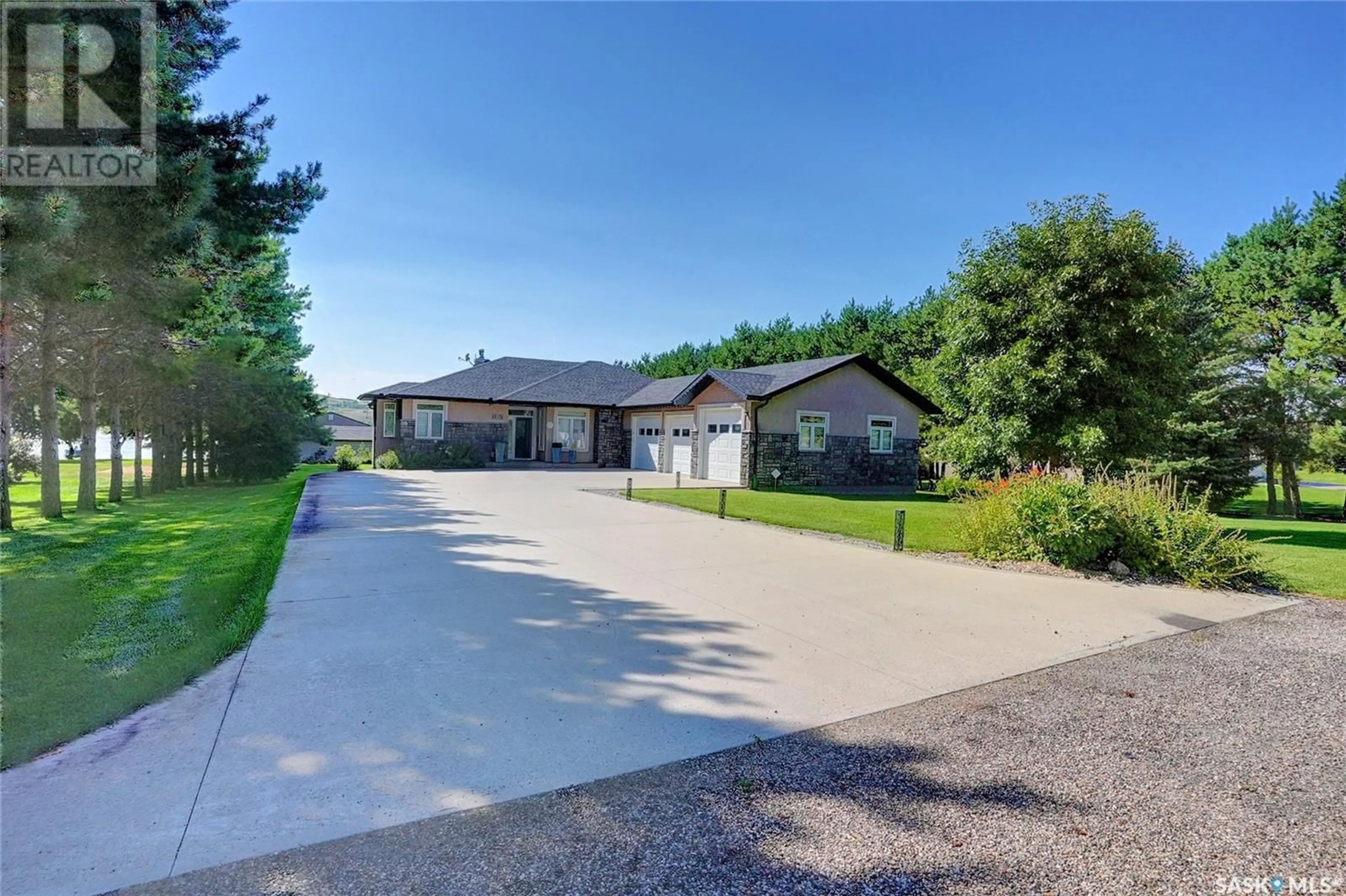 A pic from outside/outdoor area/front of a property/back of a property/a pic from drone, street for 215-217 NORTH SHORE DRIVE, Buffalo Pound Lake Saskatchewan S0H4C0