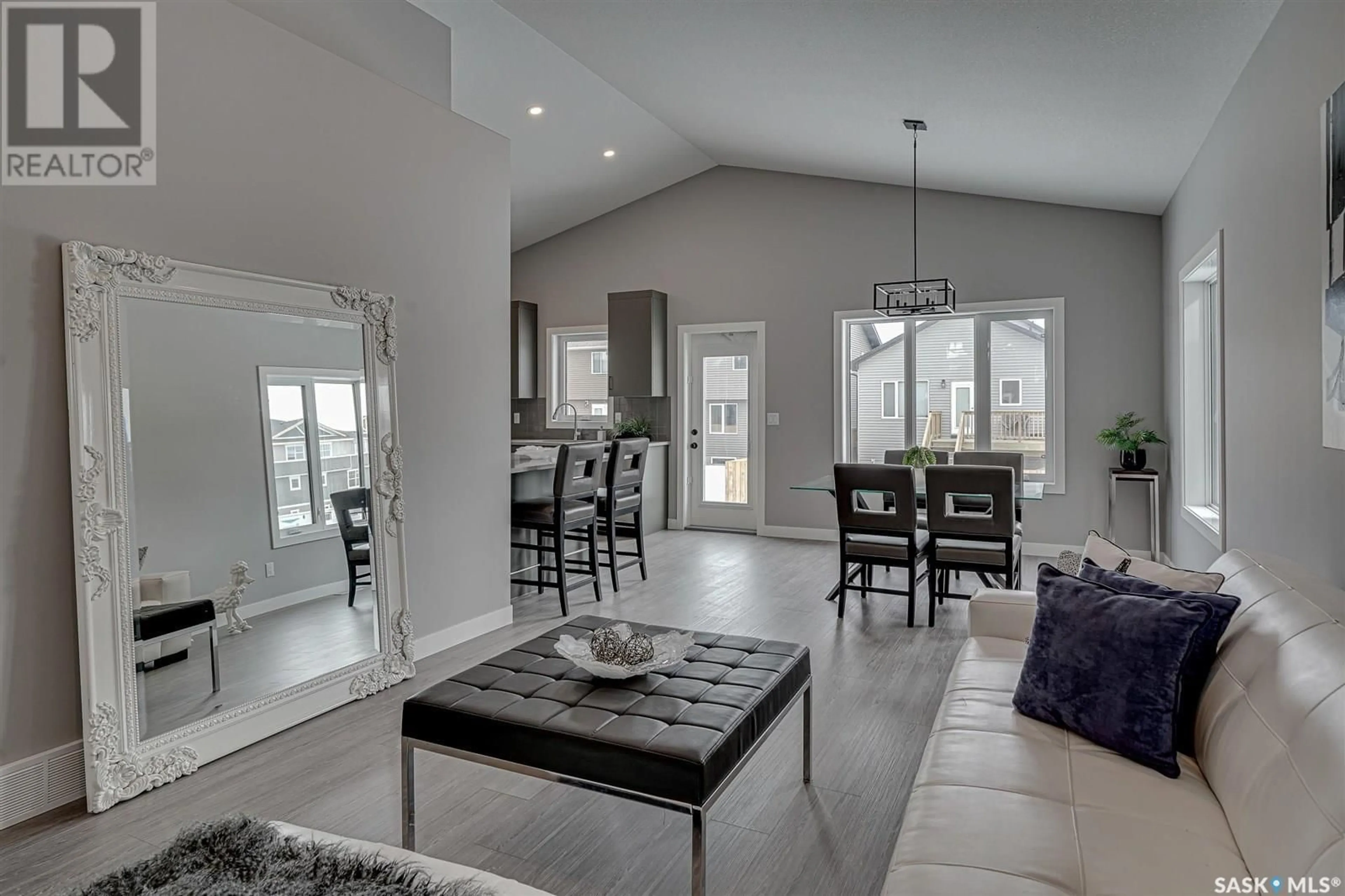 Living room with furniture, unknown for 203 ASOKAN STREET, Saskatoon Saskatchewan S7V1V9