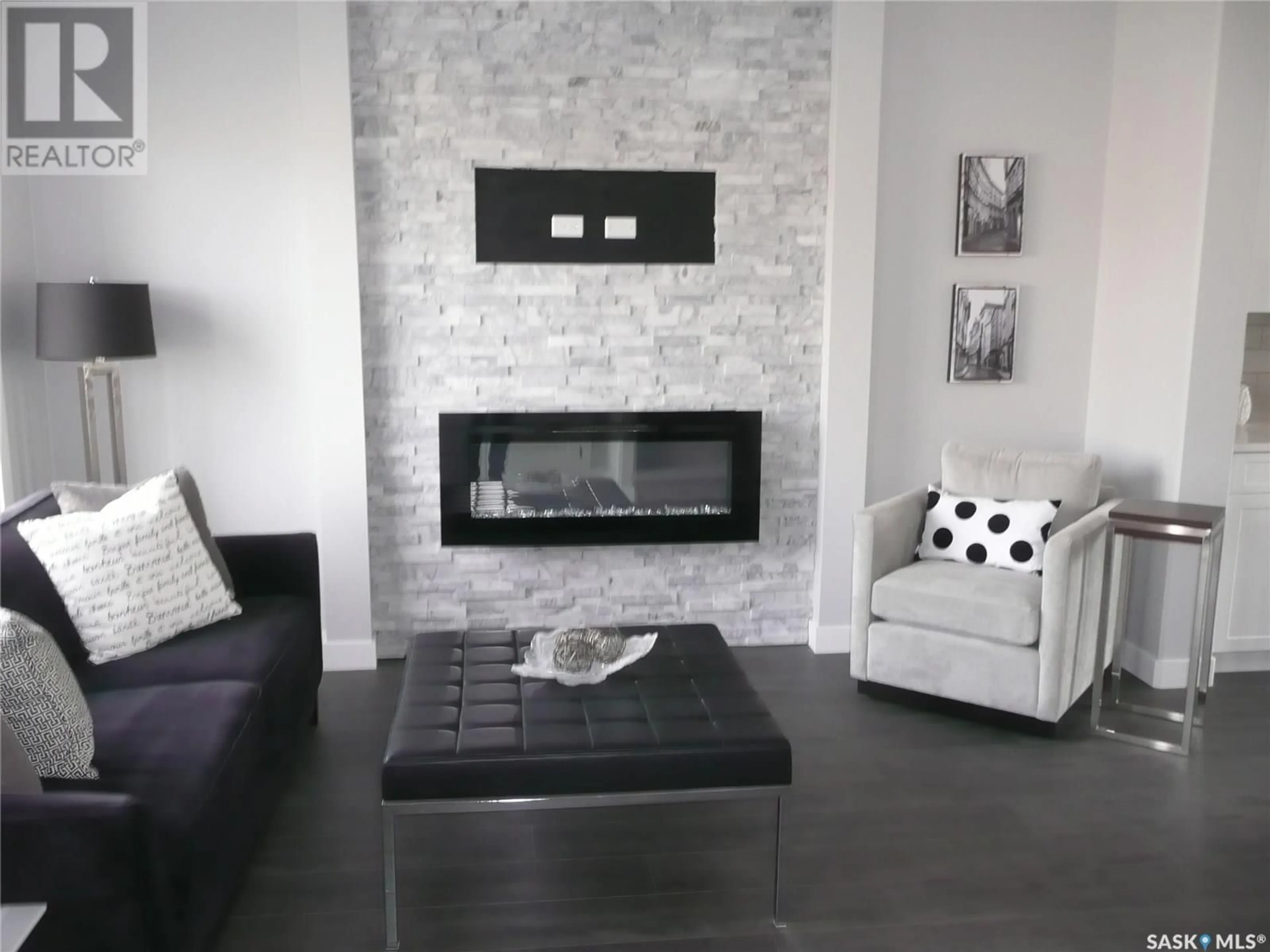 Living room with furniture, ceramic/tile floor for 326 COWESSESS ROAD, Saskatoon Saskatchewan S7V1Y4