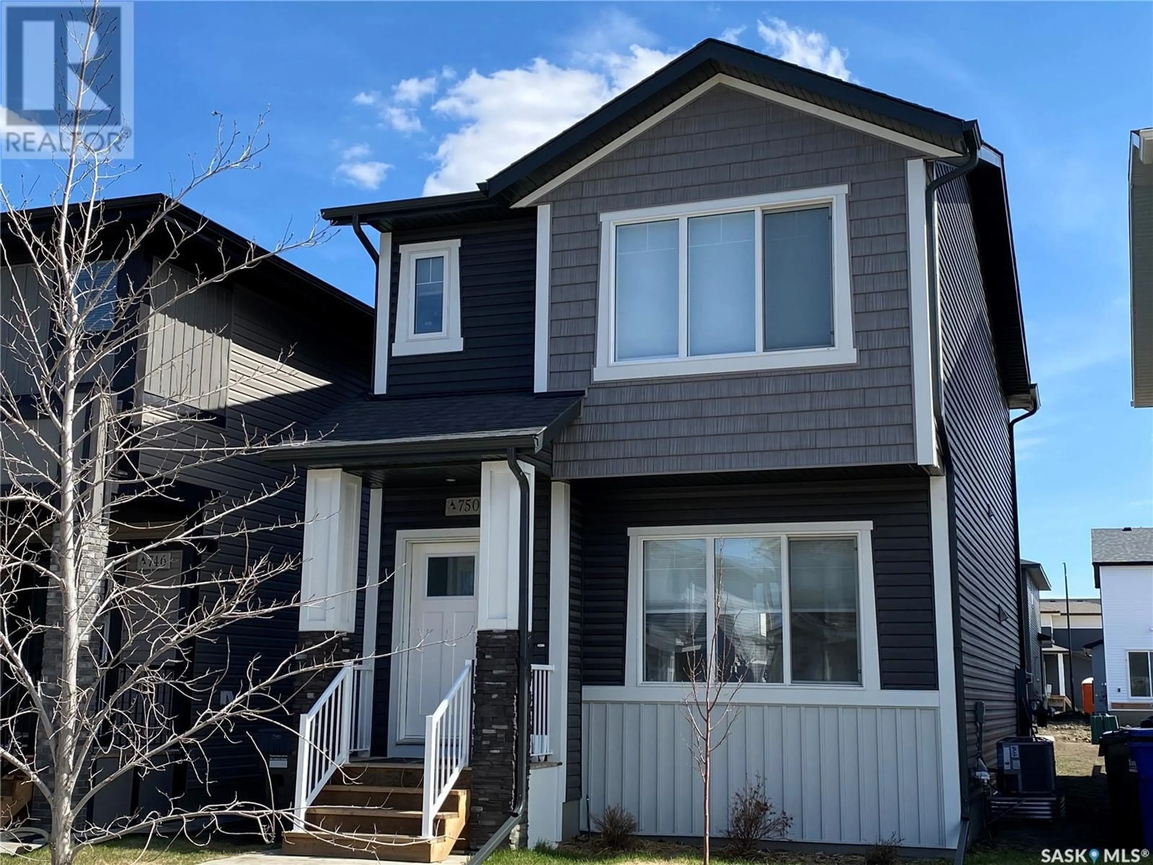 Home with vinyl exterior material, street for 314 COWESSESS ROAD, Saskatoon Saskatchewan S7V1Y4