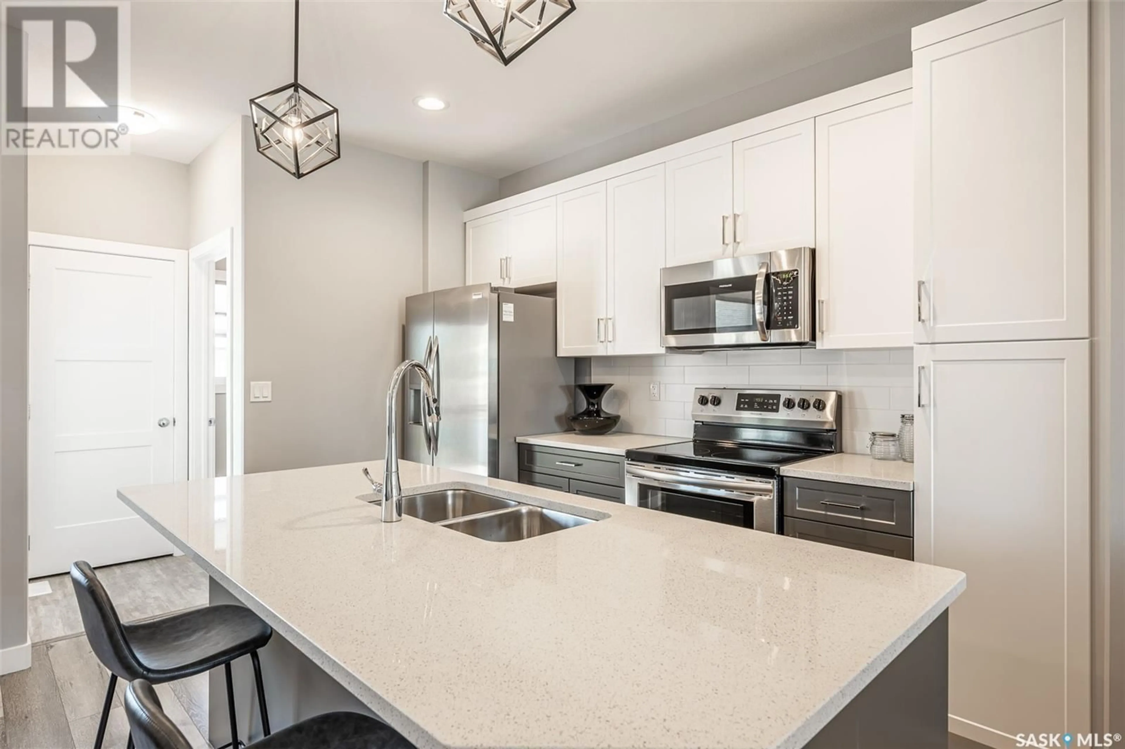 Open concept kitchen, ceramic/tile floor for 314 COWESSESS ROAD, Saskatoon Saskatchewan S7V1Y4