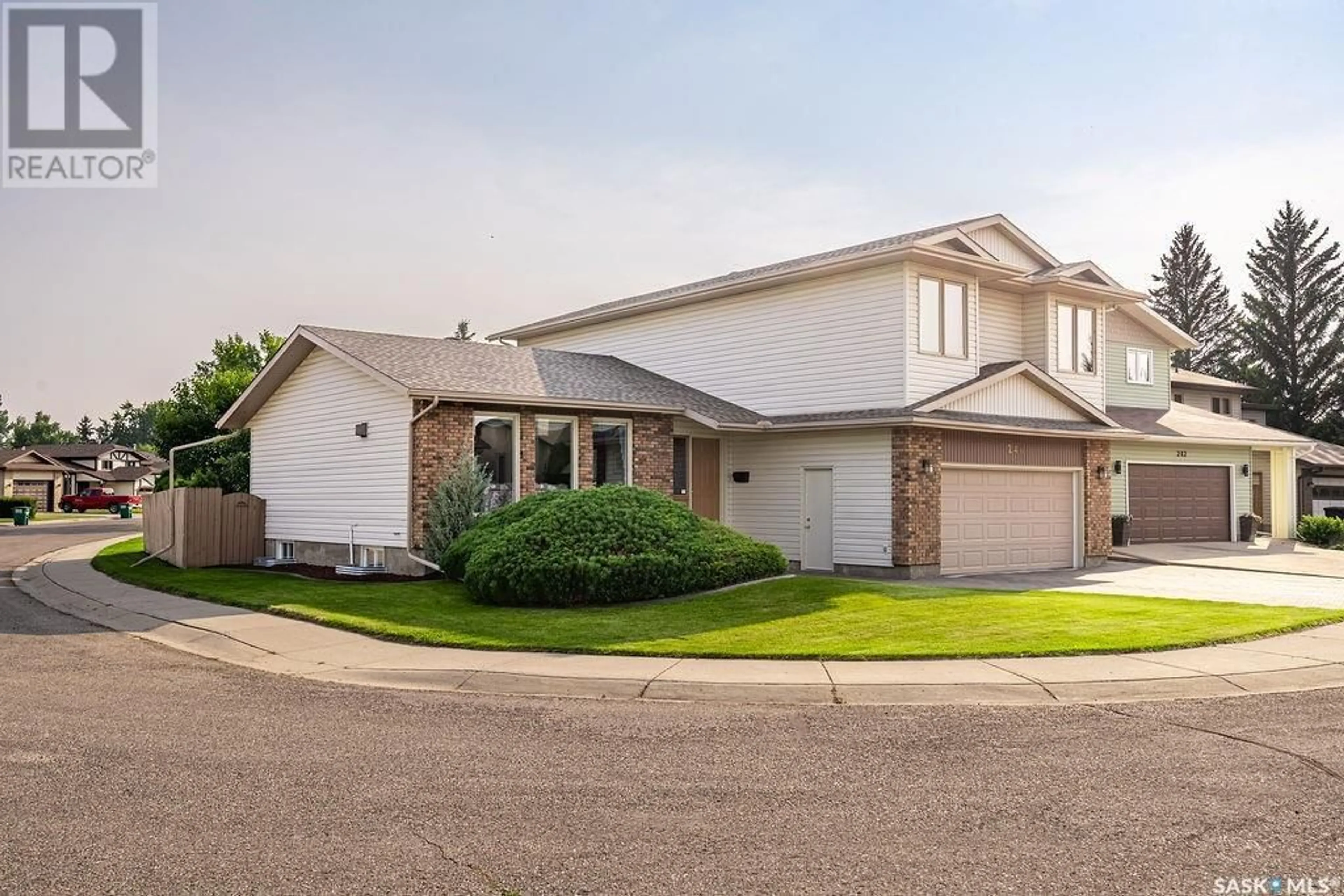 Home with vinyl exterior material, street for 246 BAKER PLACE, Saskatoon Saskatchewan S7N3L1