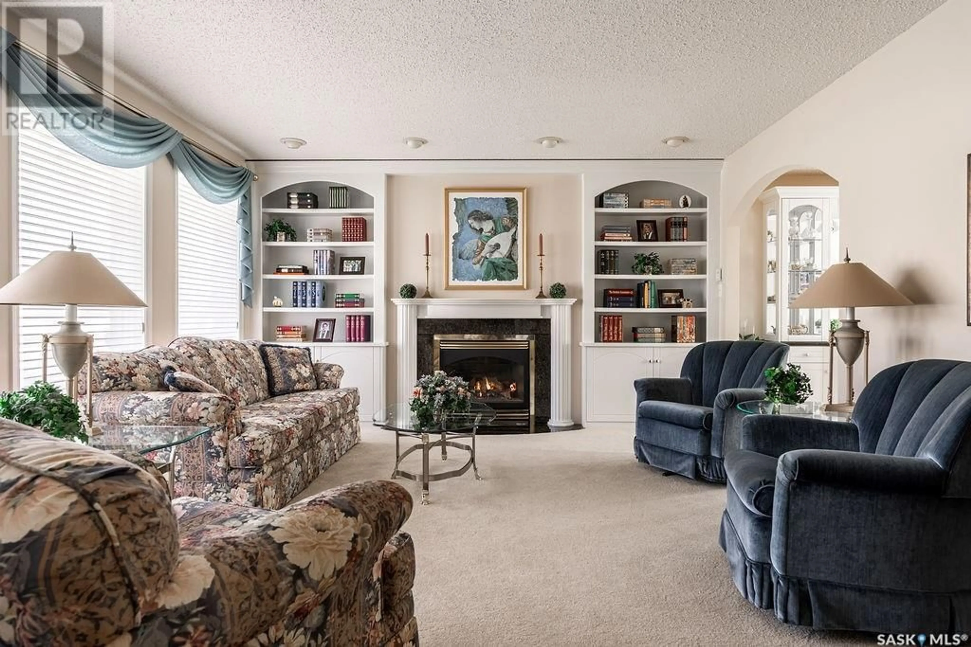 Living room with furniture, carpet floor for 246 BAKER PLACE, Saskatoon Saskatchewan S7N3L1