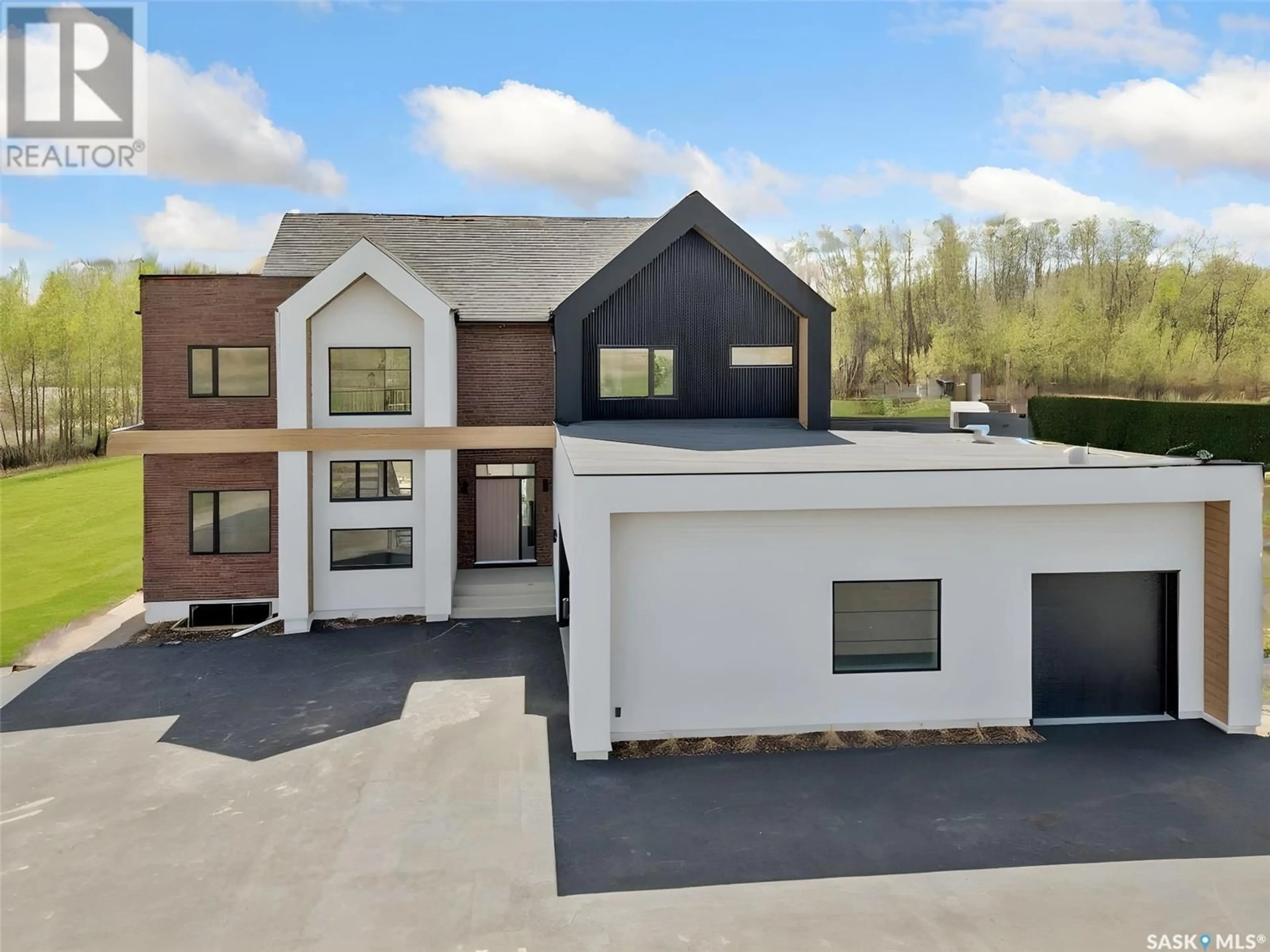 A pic from outside/outdoor area/front of a property/back of a property/a pic from drone, unknown for 108 RAVENSWOOD ROAD, Corman Park Rm No. 344 Saskatchewan S7T1E4