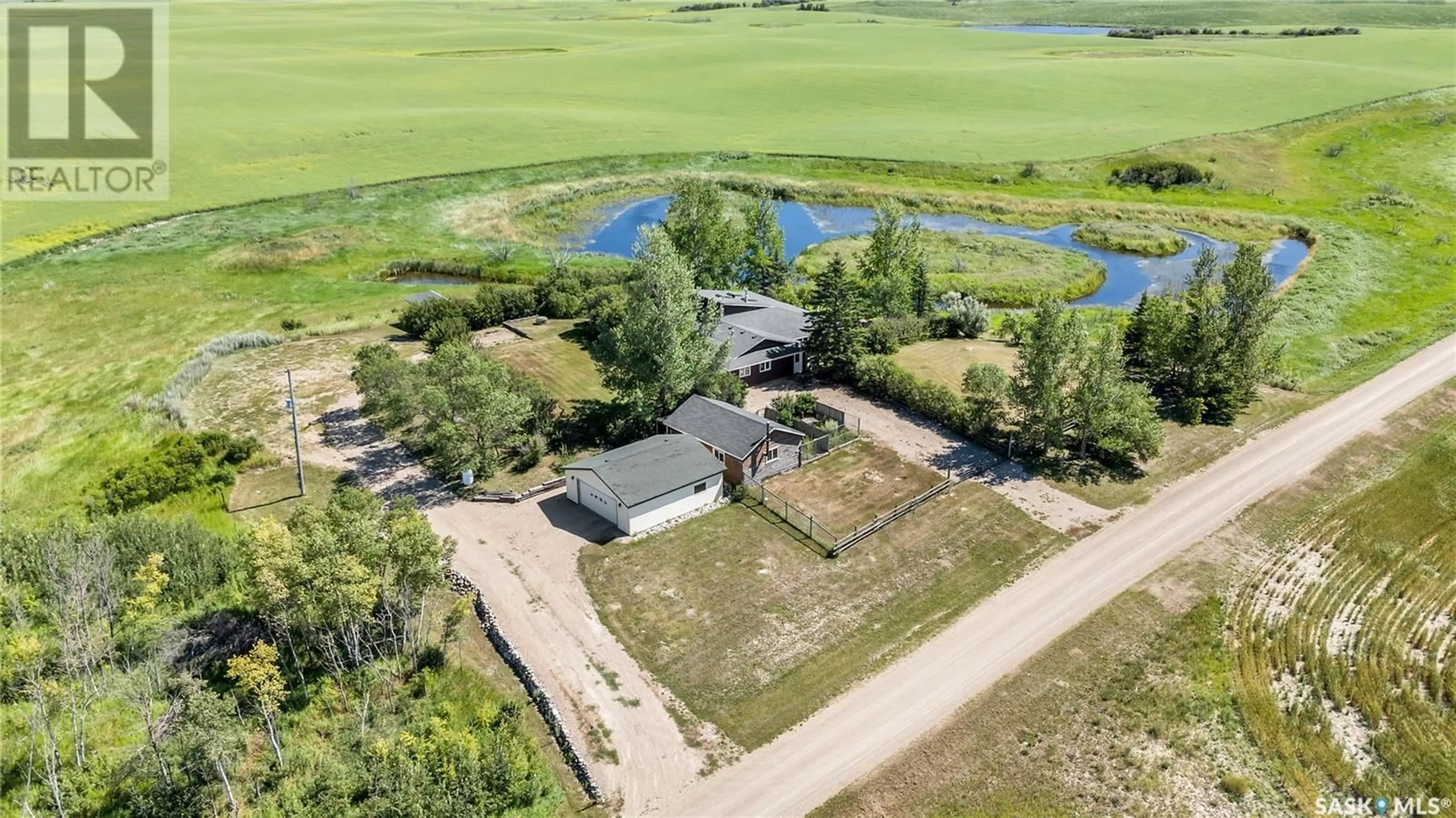 A pic from outside/outdoor area/front of a property/back of a property/a pic from drone, water/lake/river/ocean view for MERIDIAN ROAD, Colonsay Rm No. 342 Saskatchewan S0K3W0