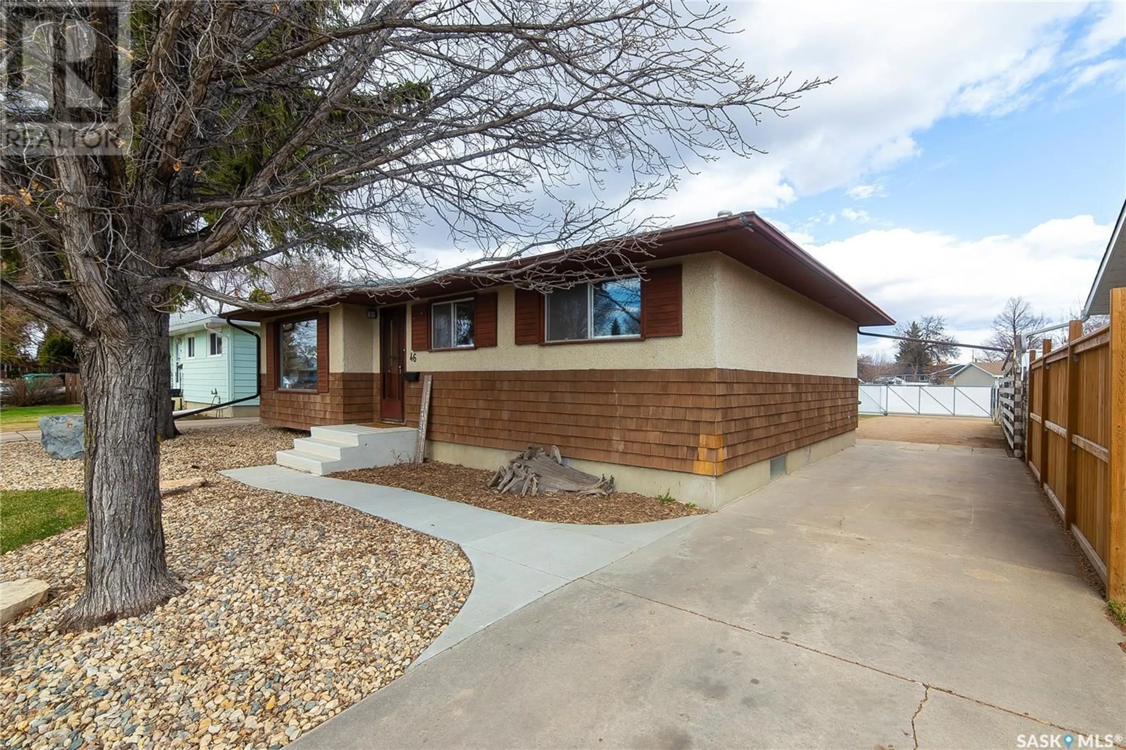 Home with brick exterior material, street for 46 MORRIS DRIVE, Saskatoon Saskatchewan S7L3T9