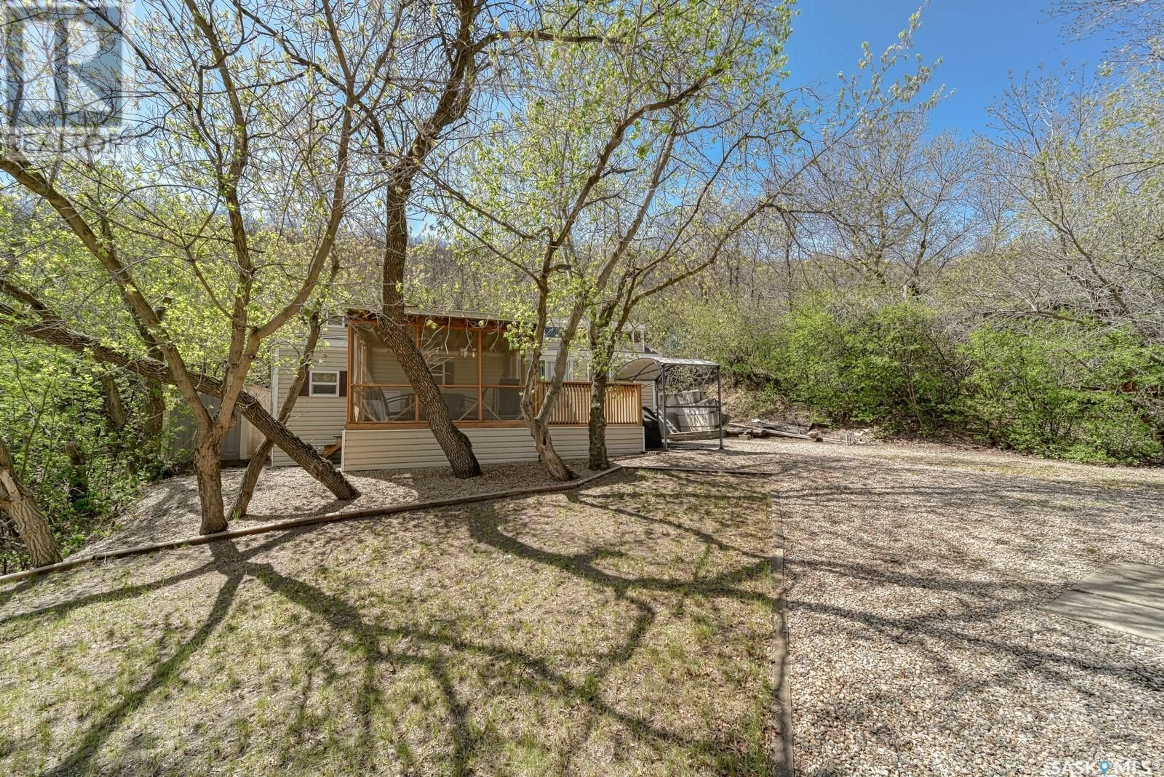 Patio, forest/trees view for 829 TATANKA DRIVE, Buffalo Pound Lake Saskatchewan S0H4C0