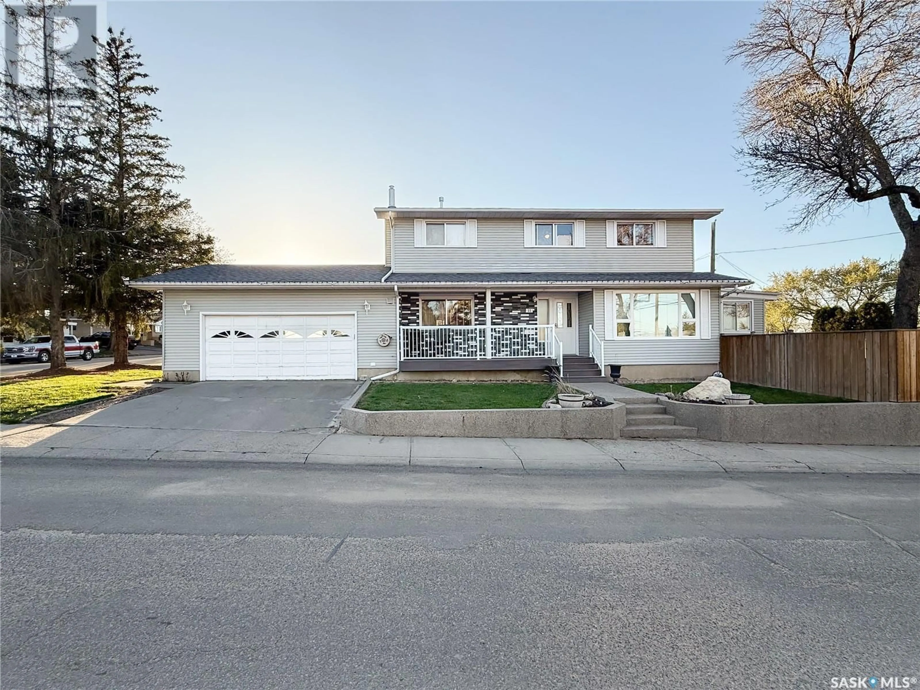 Home with vinyl exterior material, street for 11 CONLIN DRIVE, Swift Current Saskatchewan S9H3A7