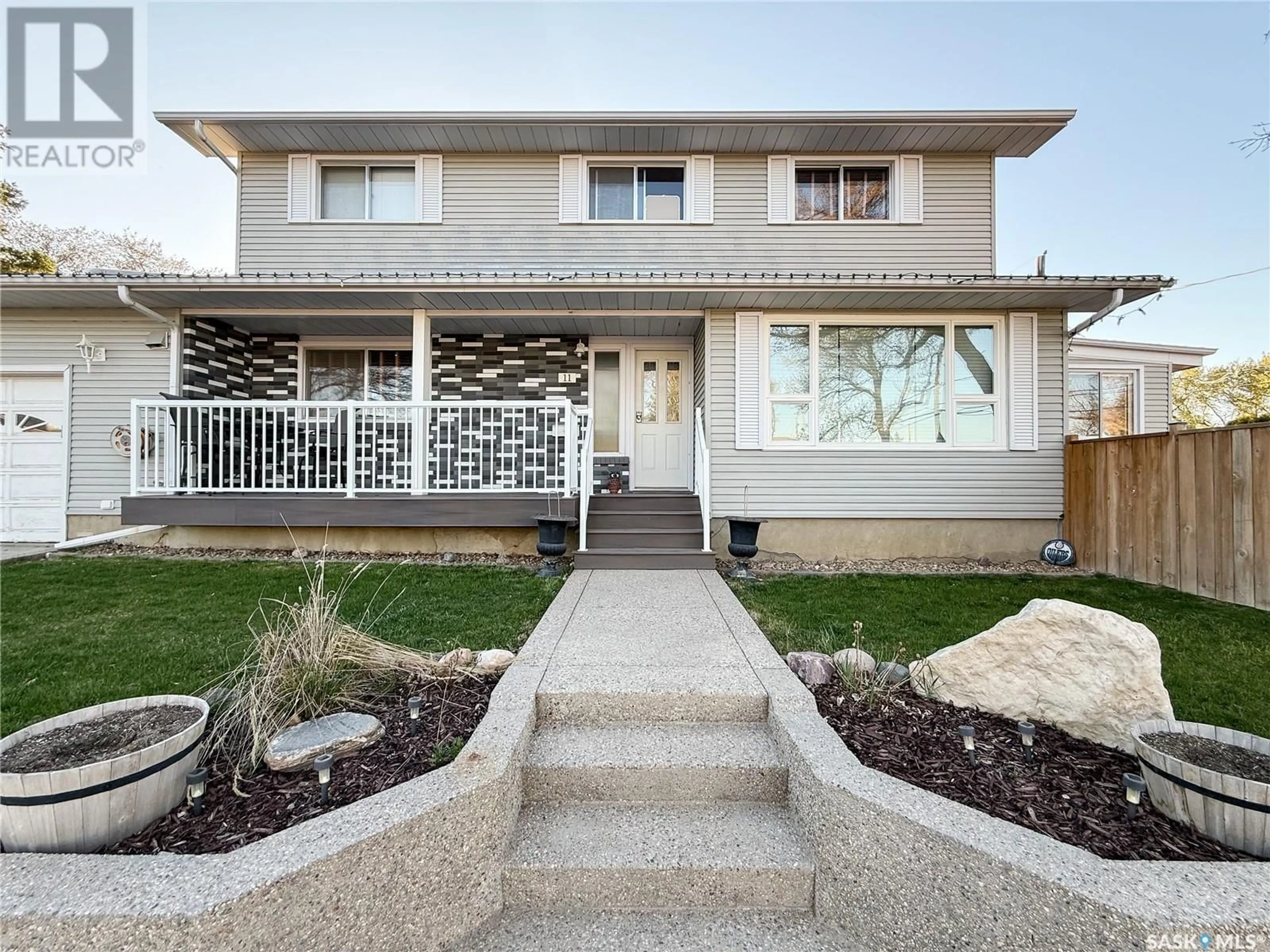 Home with vinyl exterior material, street for 11 CONLIN DRIVE, Swift Current Saskatchewan S9H3A7