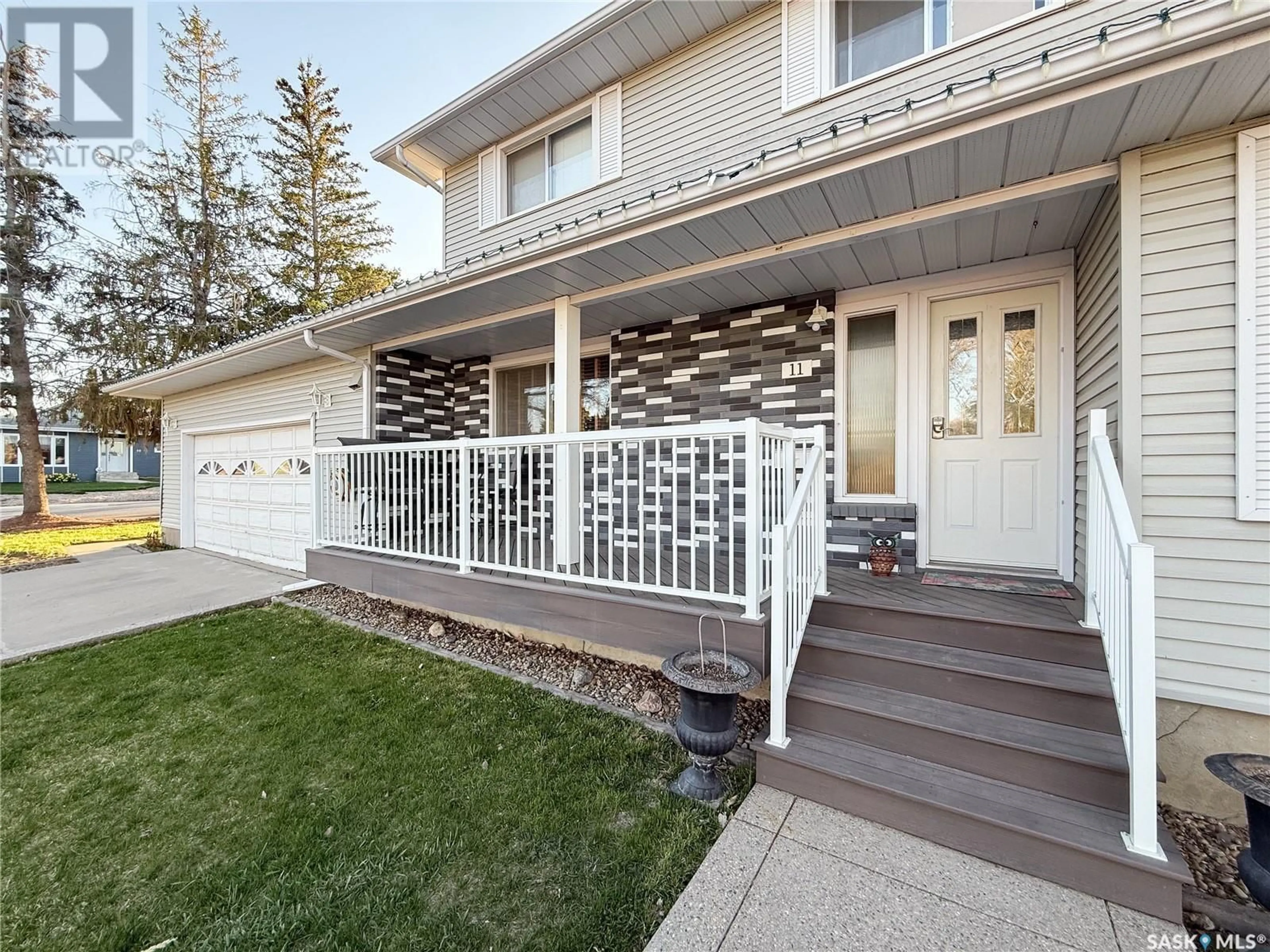 Home with vinyl exterior material, street for 11 CONLIN DRIVE, Swift Current Saskatchewan S9H3A7