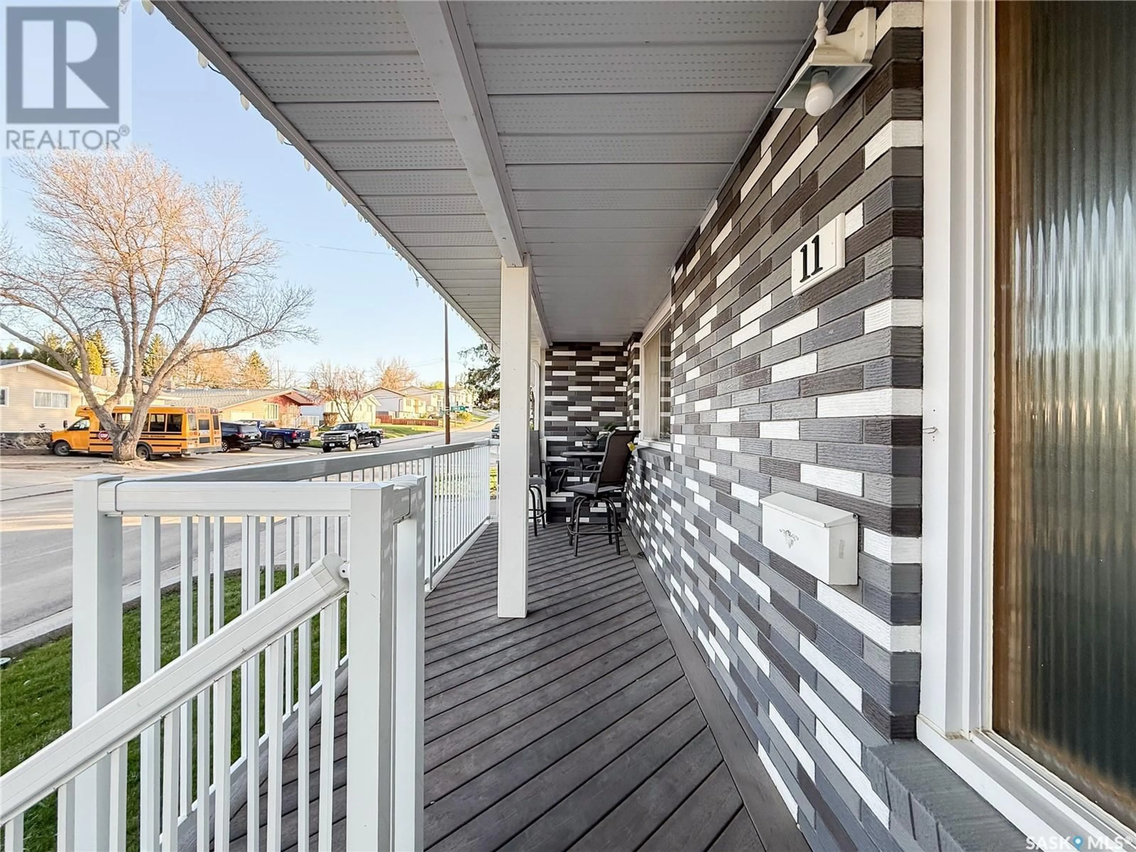 Home with vinyl exterior material, street for 11 CONLIN DRIVE, Swift Current Saskatchewan S9H3A7