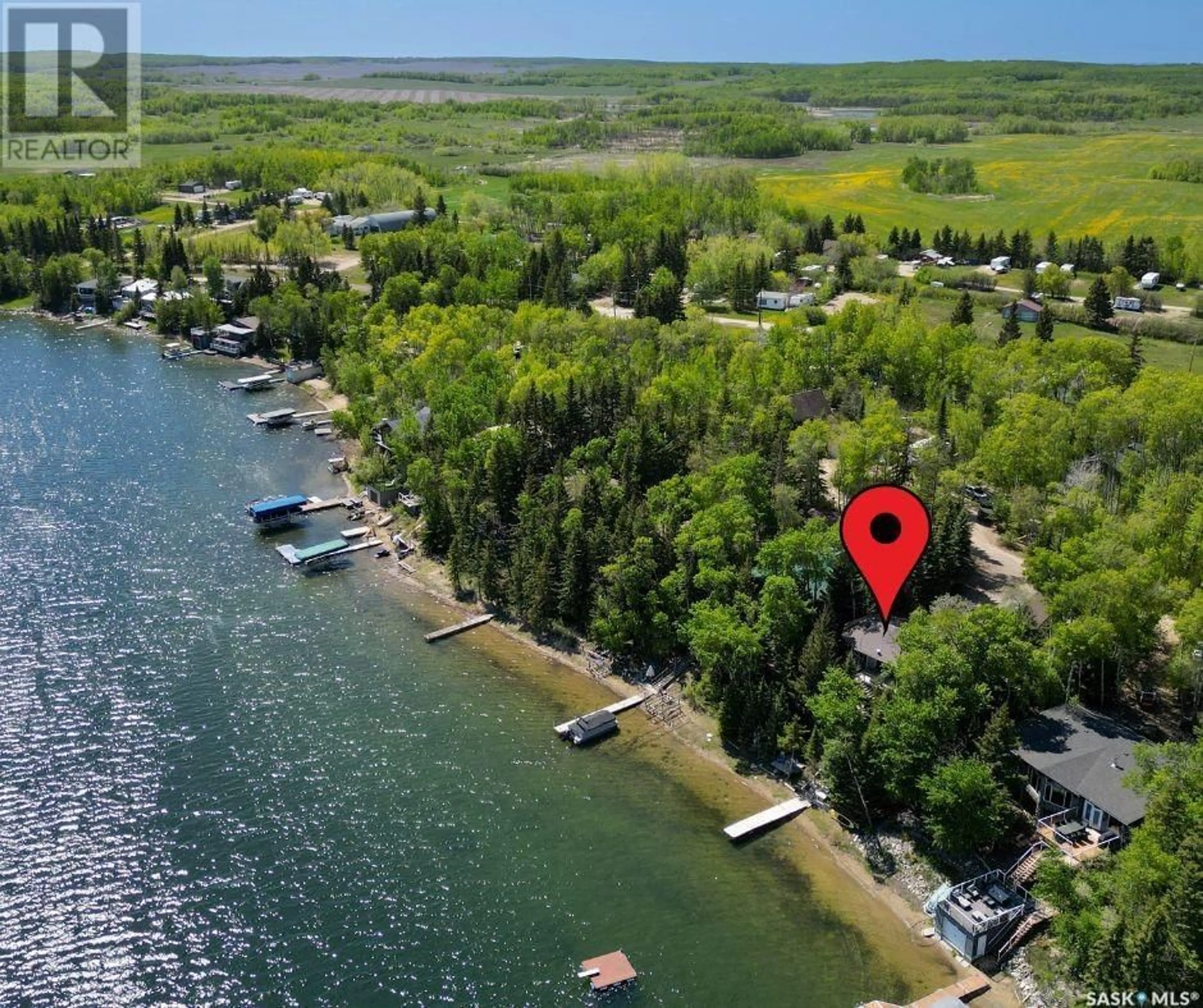A pic from outside/outdoor area/front of a property/back of a property/a pic from drone, water/lake/river/ocean view for 6 WHITE BIRCH DRIVE, Lucien Lake Saskatchewan S0K2X0