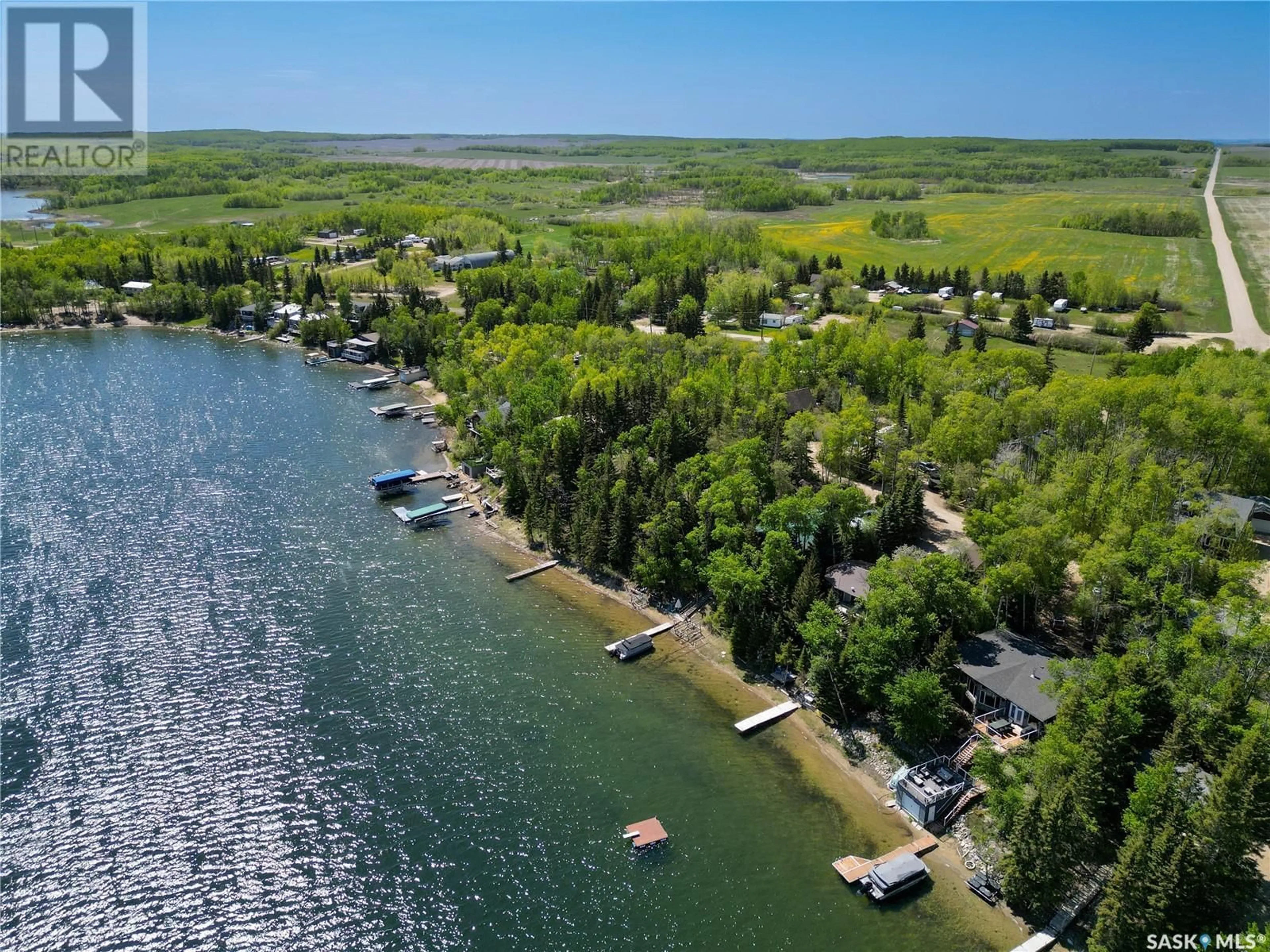 A pic from outside/outdoor area/front of a property/back of a property/a pic from drone, water/lake/river/ocean view for 6 WHITE BIRCH DRIVE, Three Lakes Rm No. 400 Saskatchewan S0K2X0