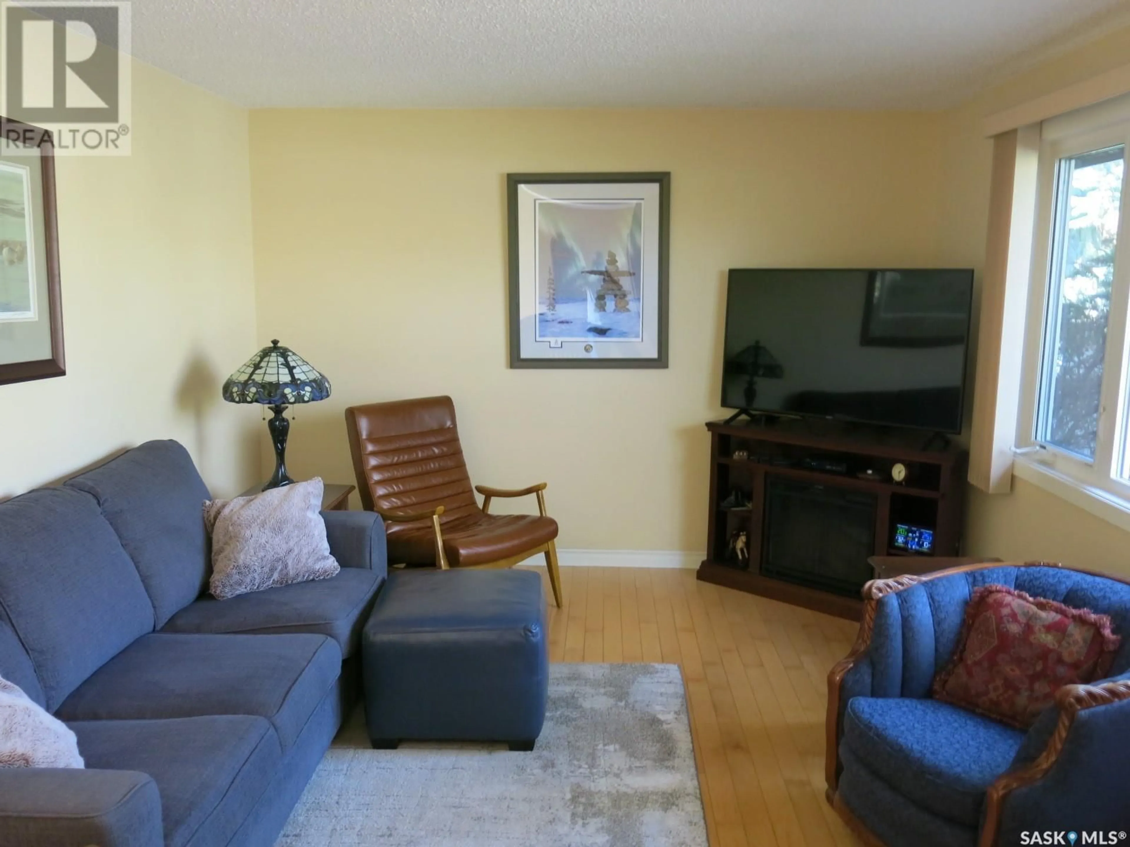 Living room with furniture, unknown for 1253 MCNAUGHTON AVENUE, Saskatoon Saskatchewan S7M3X6