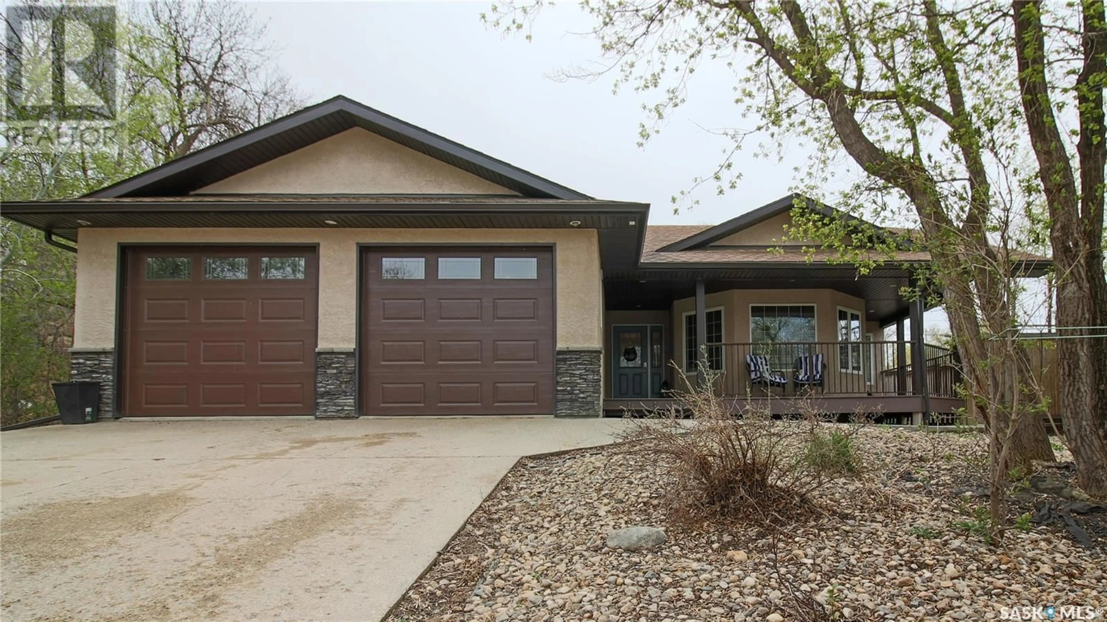 Home with brick exterior material, street for 471 NICOLL AVENUE, Regina Beach Saskatchewan S0G4C0