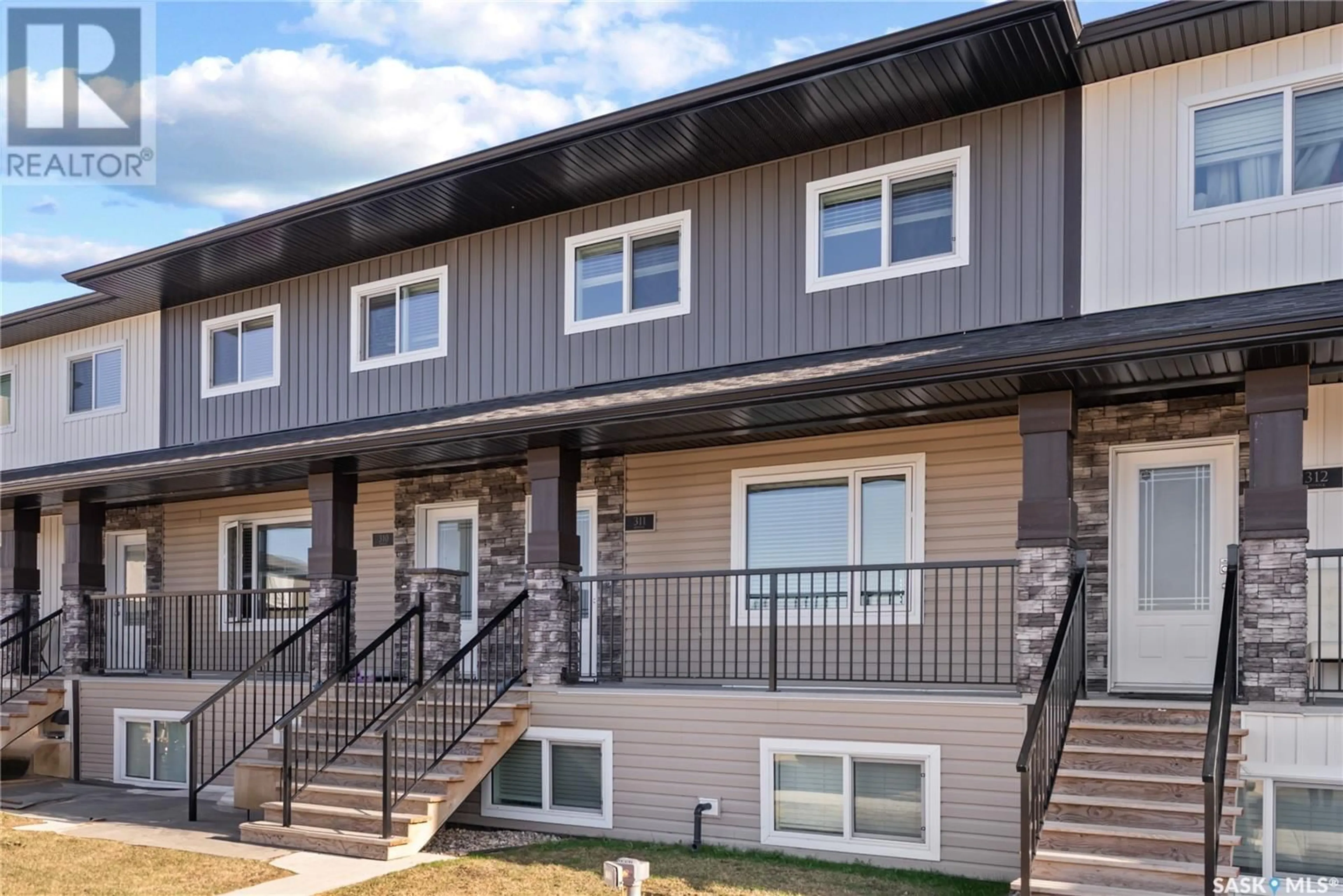 Home with vinyl exterior material, unknown for 311 110 AKHTAR BEND, Saskatoon Saskatchewan S7W0Y9