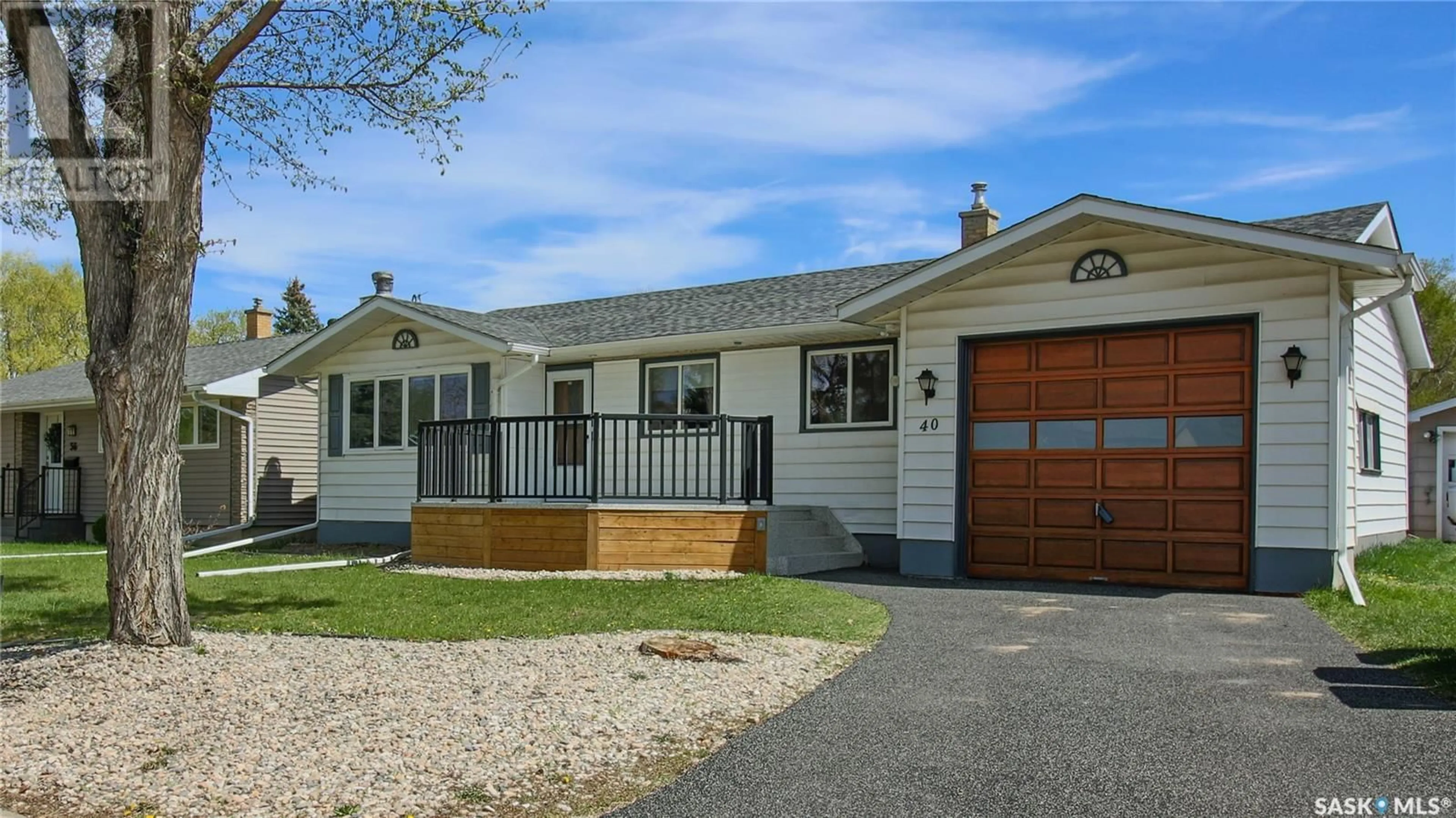 Home with vinyl exterior material, street for 40 UPLAND DRIVE, Regina Saskatchewan S4R0B9