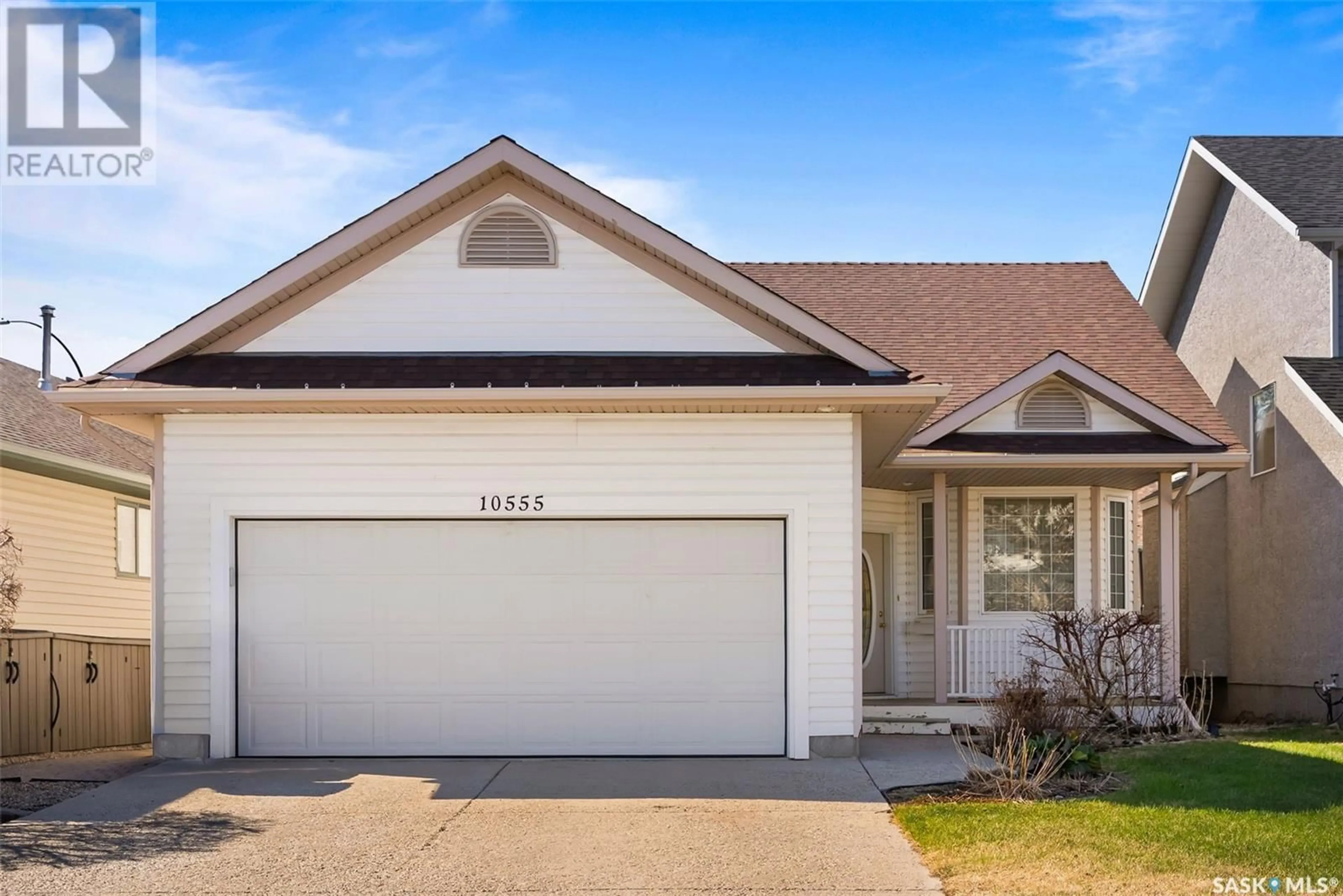 Home with vinyl exterior material, street for 10555 WASCANA ESTATES, Regina Saskatchewan S4V2X1