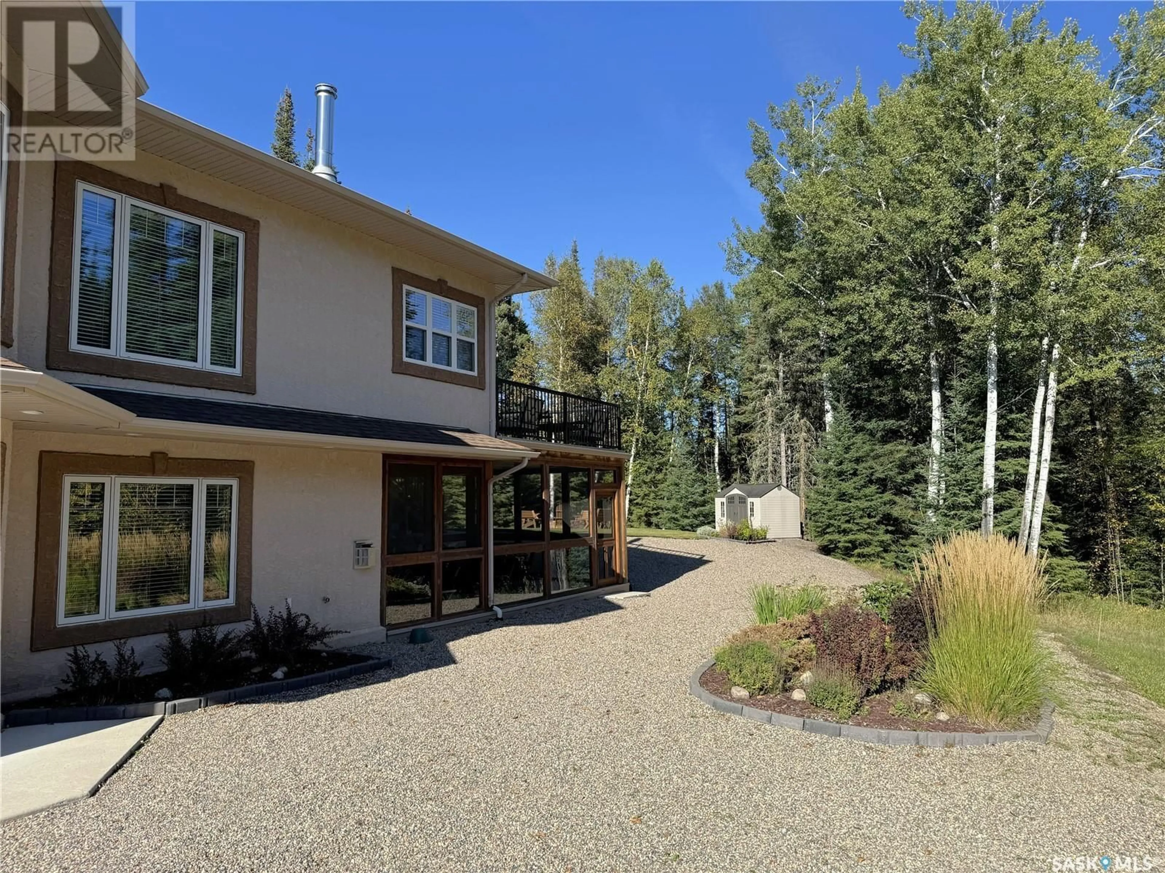 A pic from outside/outdoor area/front of a property/back of a property/a pic from drone, unknown for 82 ESTATES DRIVE, Elk Ridge Saskatchewan S0J0N0