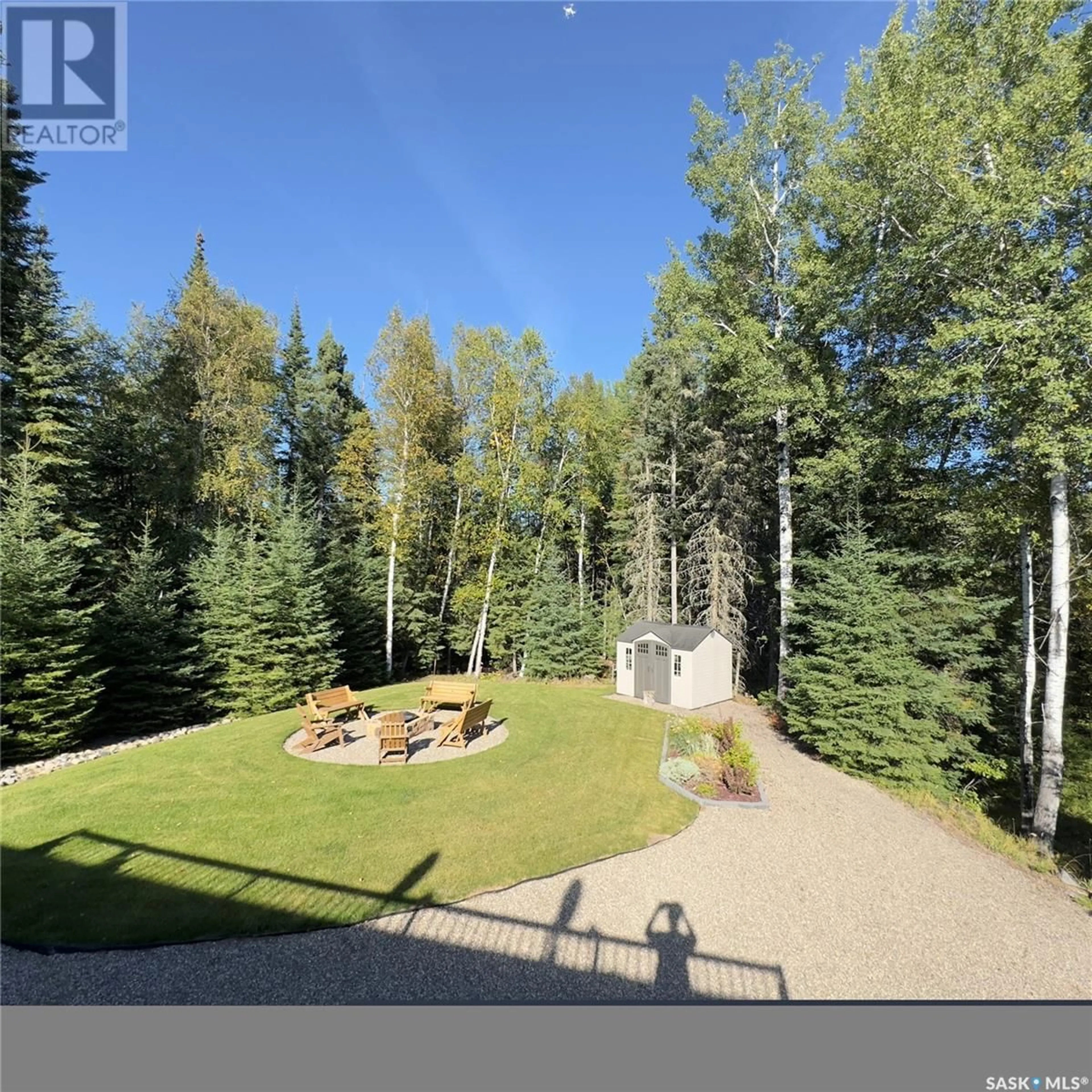 A pic from outside/outdoor area/front of a property/back of a property/a pic from drone, forest/trees view for 82 ESTATES DRIVE, Elk Ridge Saskatchewan S0J0N0