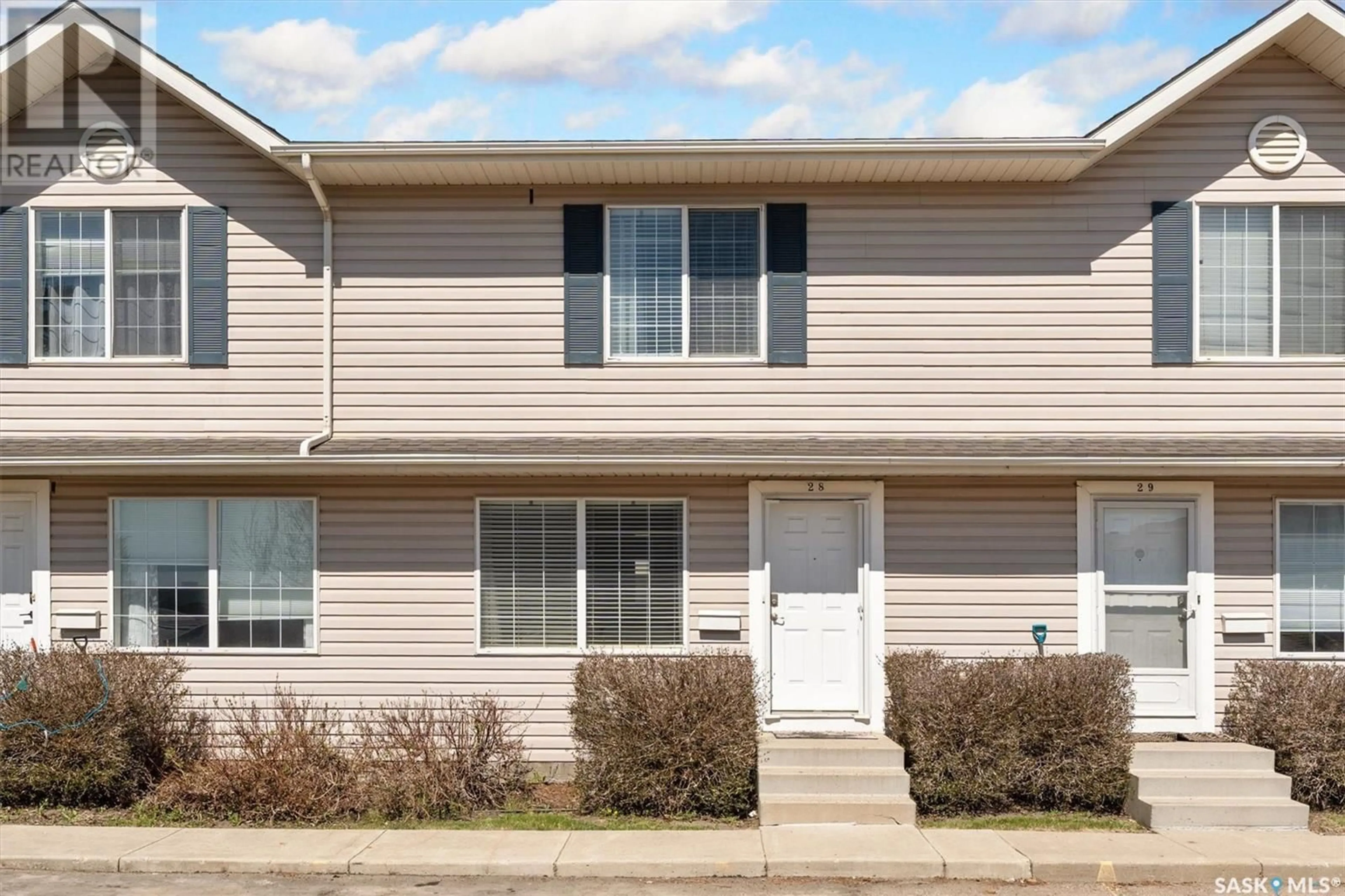 Home with vinyl exterior material, street for 809 - 28 KRISTJANSON ROAD, Saskatoon Saskatchewan S7S1M8