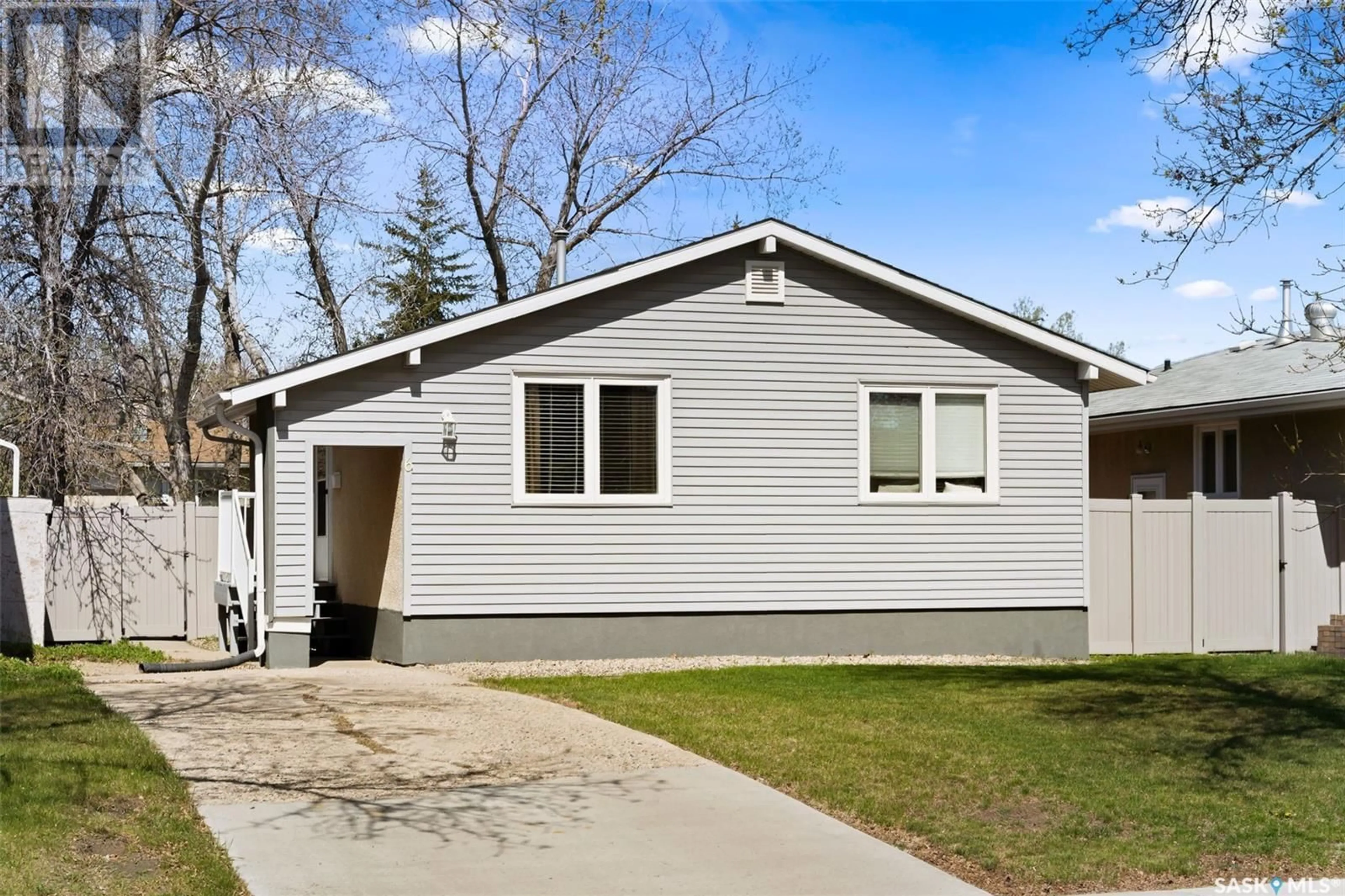Home with vinyl exterior material, street for 6 SNEATH CRESCENT, Regina Saskatchewan S4R5P9