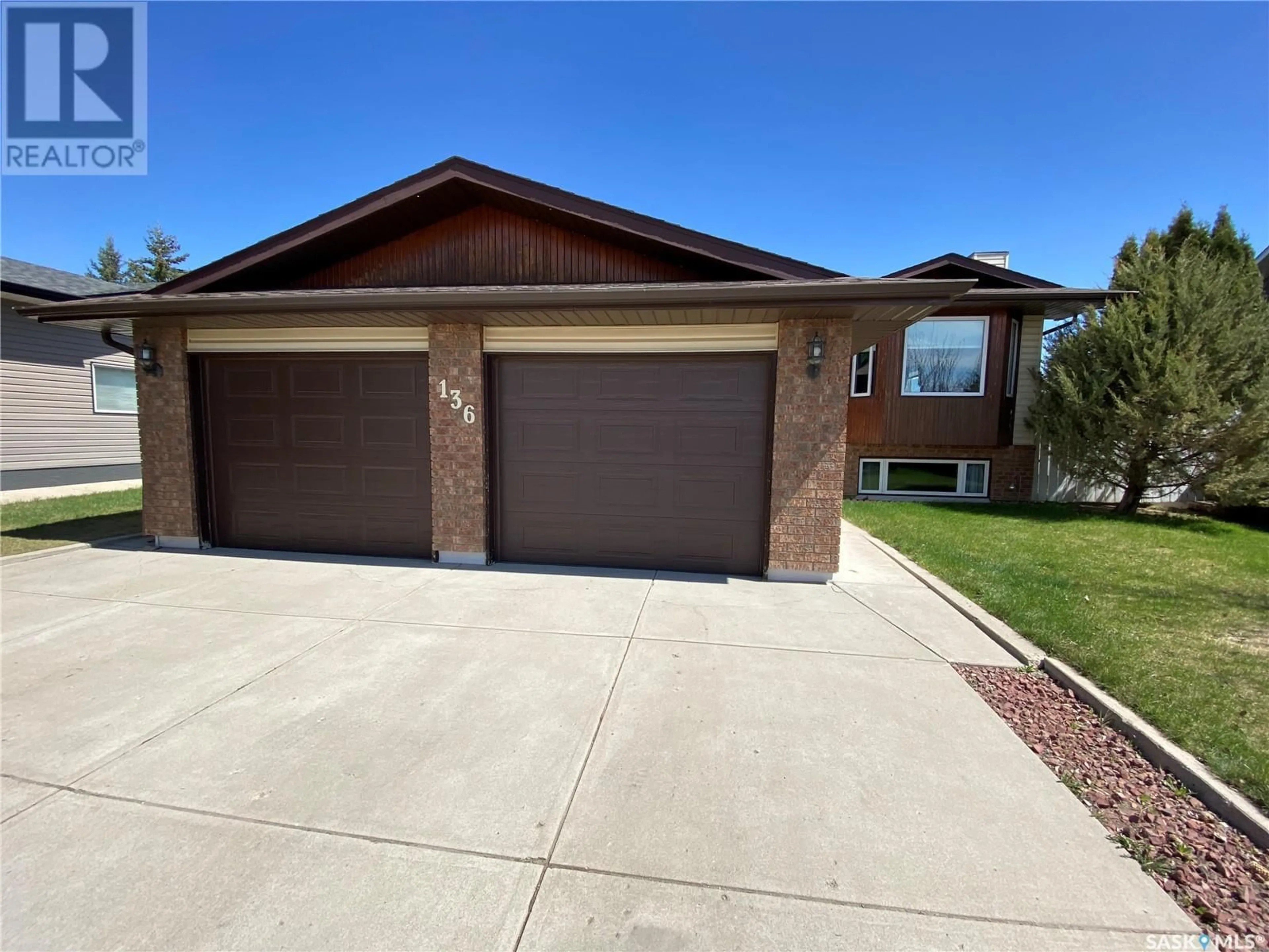 Home with brick exterior material, street for 136 MORRISON DRIVE, Yorkton Saskatchewan S3N4A6