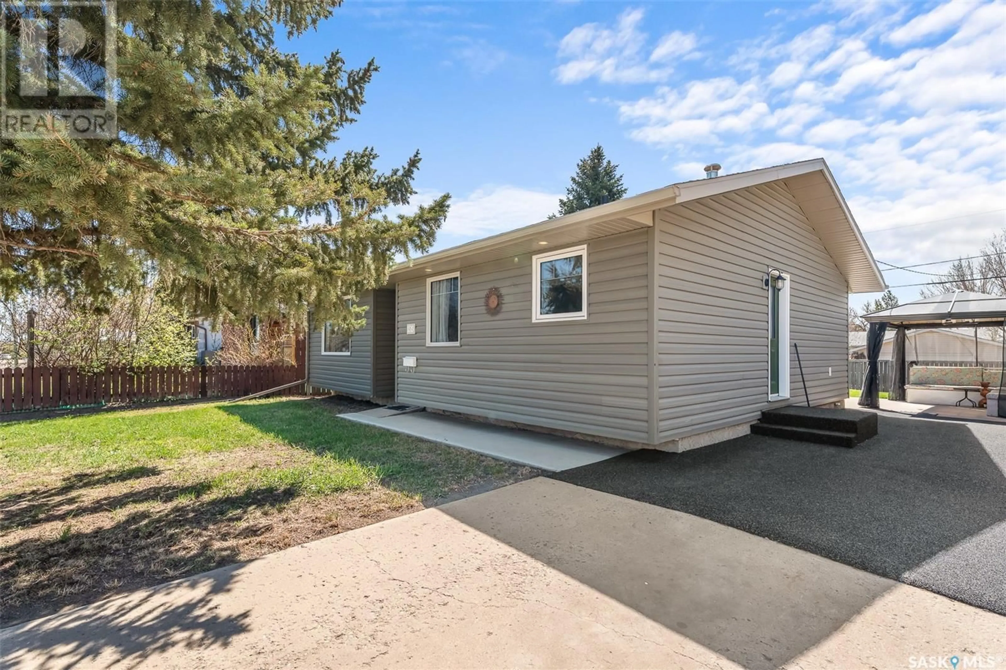 Home with vinyl exterior material, street for 1519 ATHABASCA STREET, Moose Jaw Saskatchewan S6H6C2