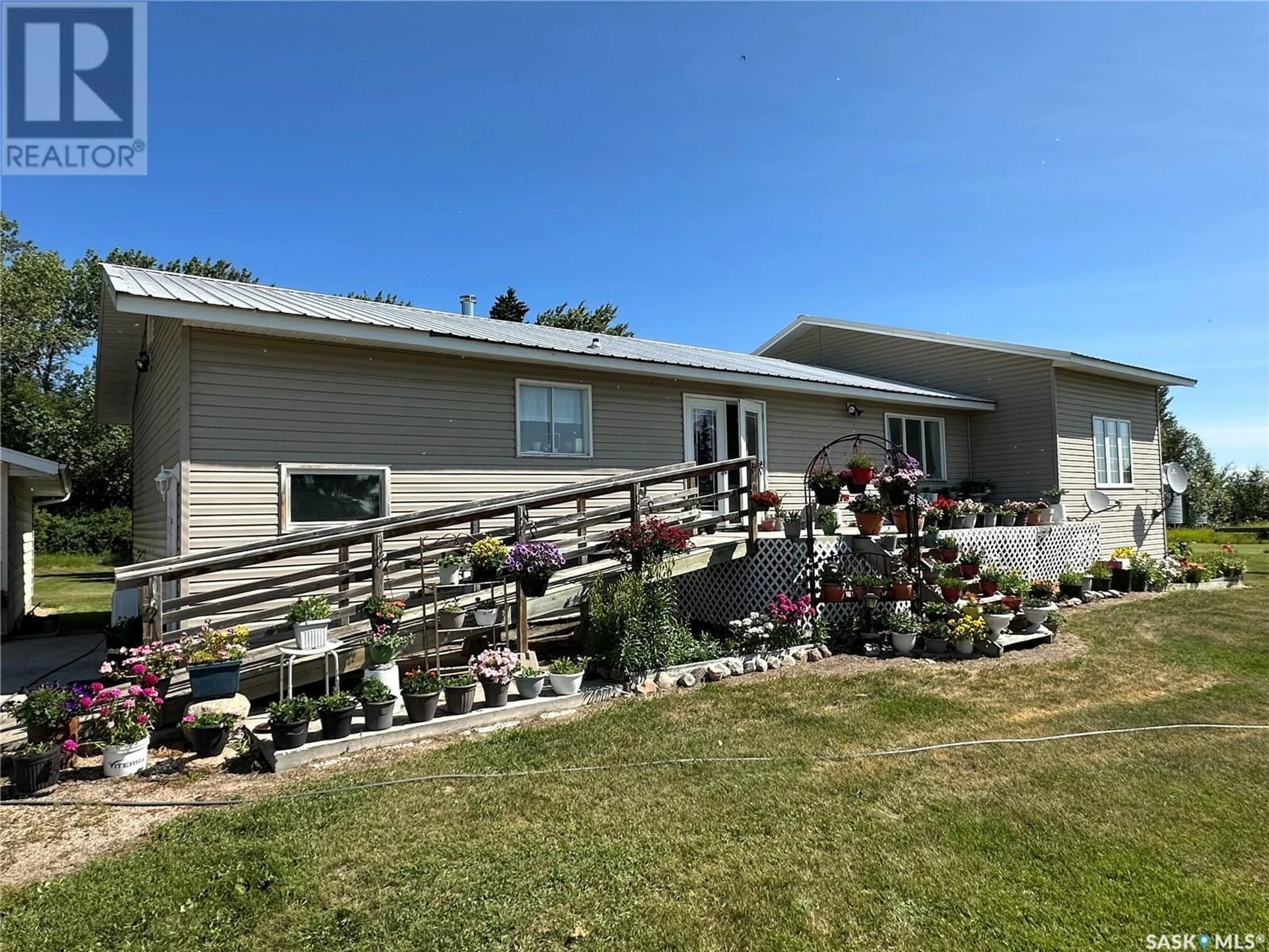 A pic from outside/outdoor area/front of a property/back of a property/a pic from drone, water/lake/river/ocean view for SANDER ACREAGE, Paddockwood Rm No. 520 Saskatchewan S0J1T0