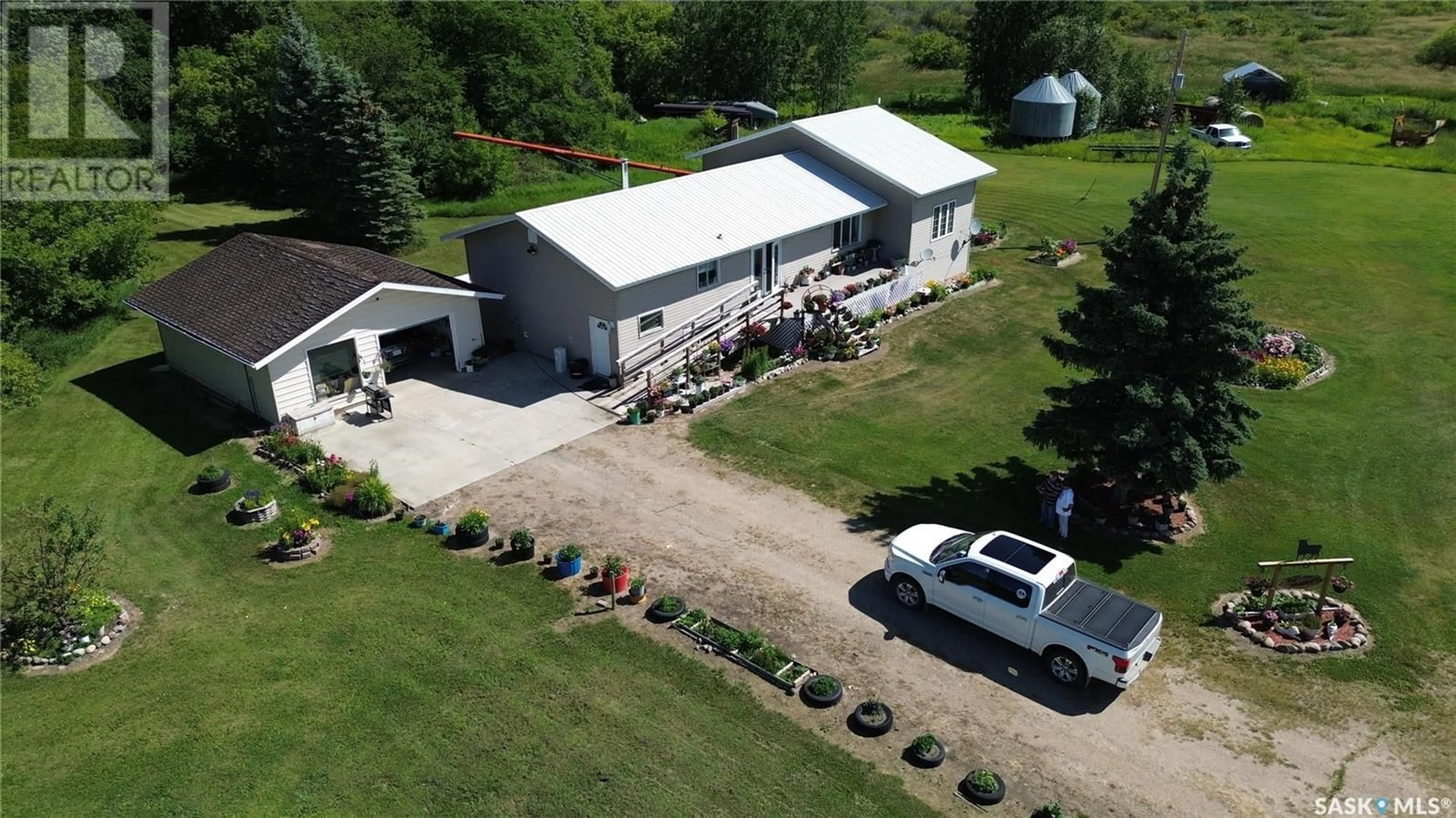 A pic from outside/outdoor area/front of a property/back of a property/a pic from drone, building for SANDER ACREAGE, Paddockwood Rm No. 520 Saskatchewan S0J1T0