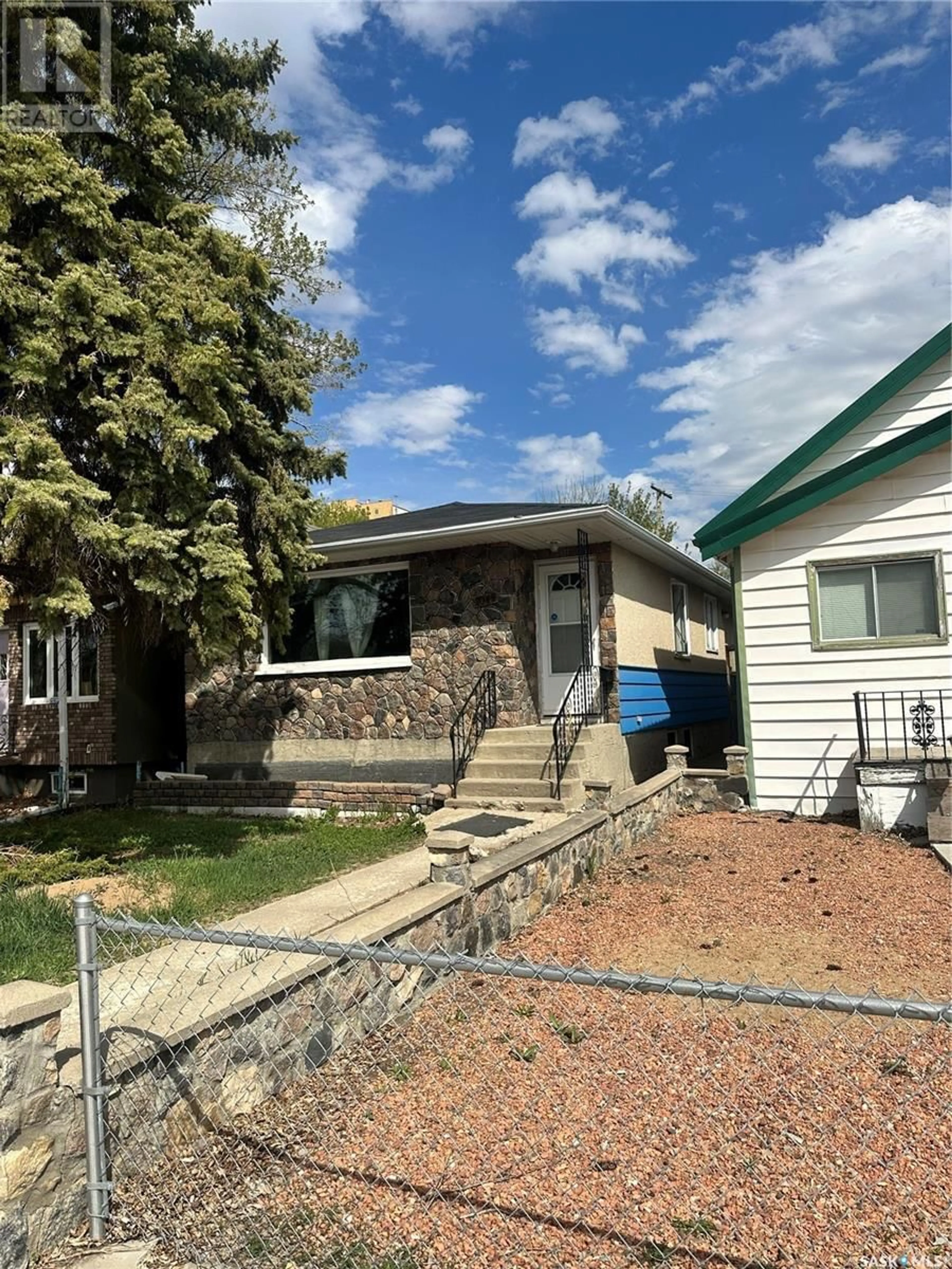 Home with vinyl exterior material, street for 2045 MONTREAL STREET, Regina Saskatchewan S4P1L5