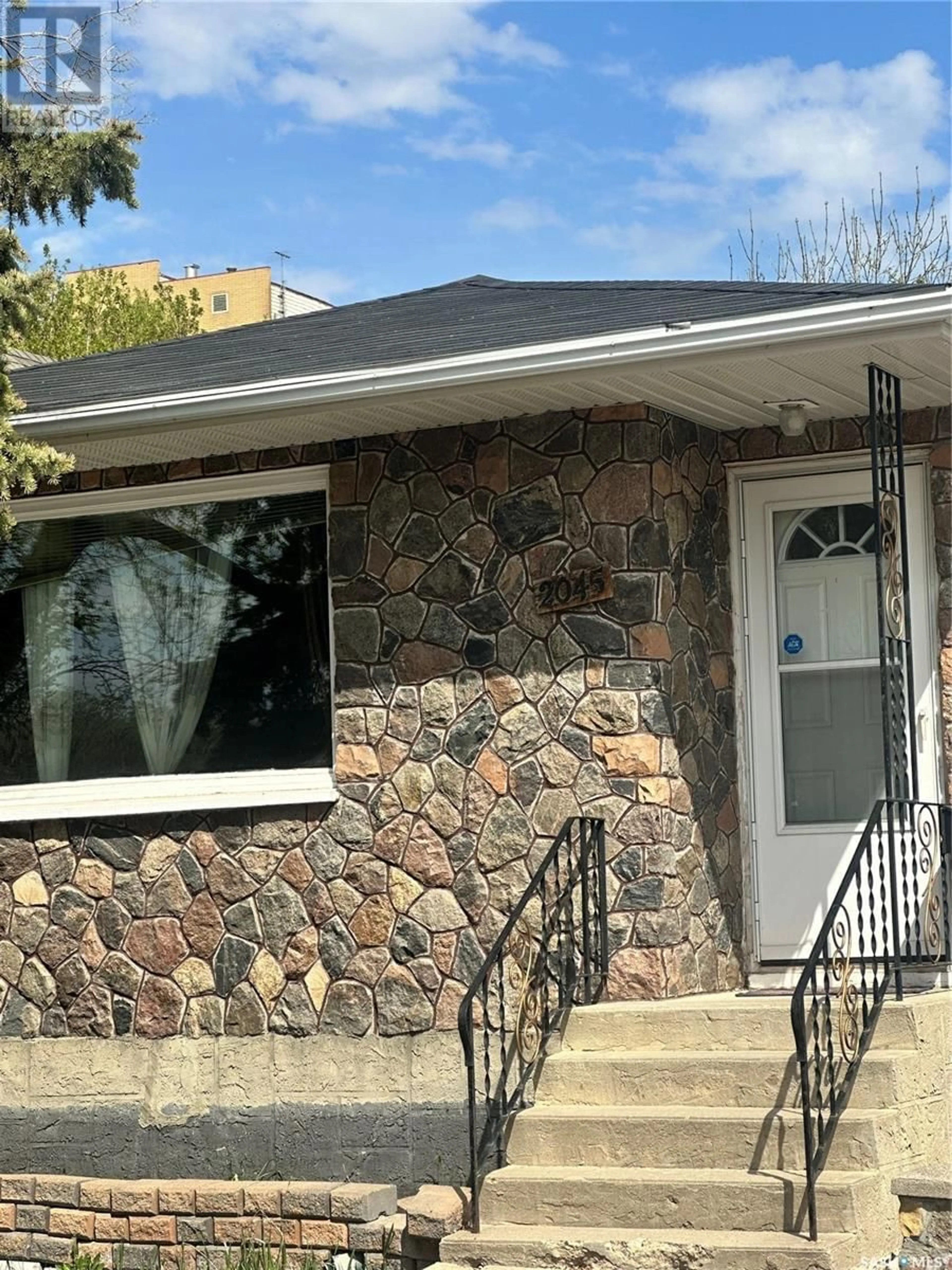 Home with brick exterior material, unknown for 2045 MONTREAL STREET, Regina Saskatchewan S4P1L5
