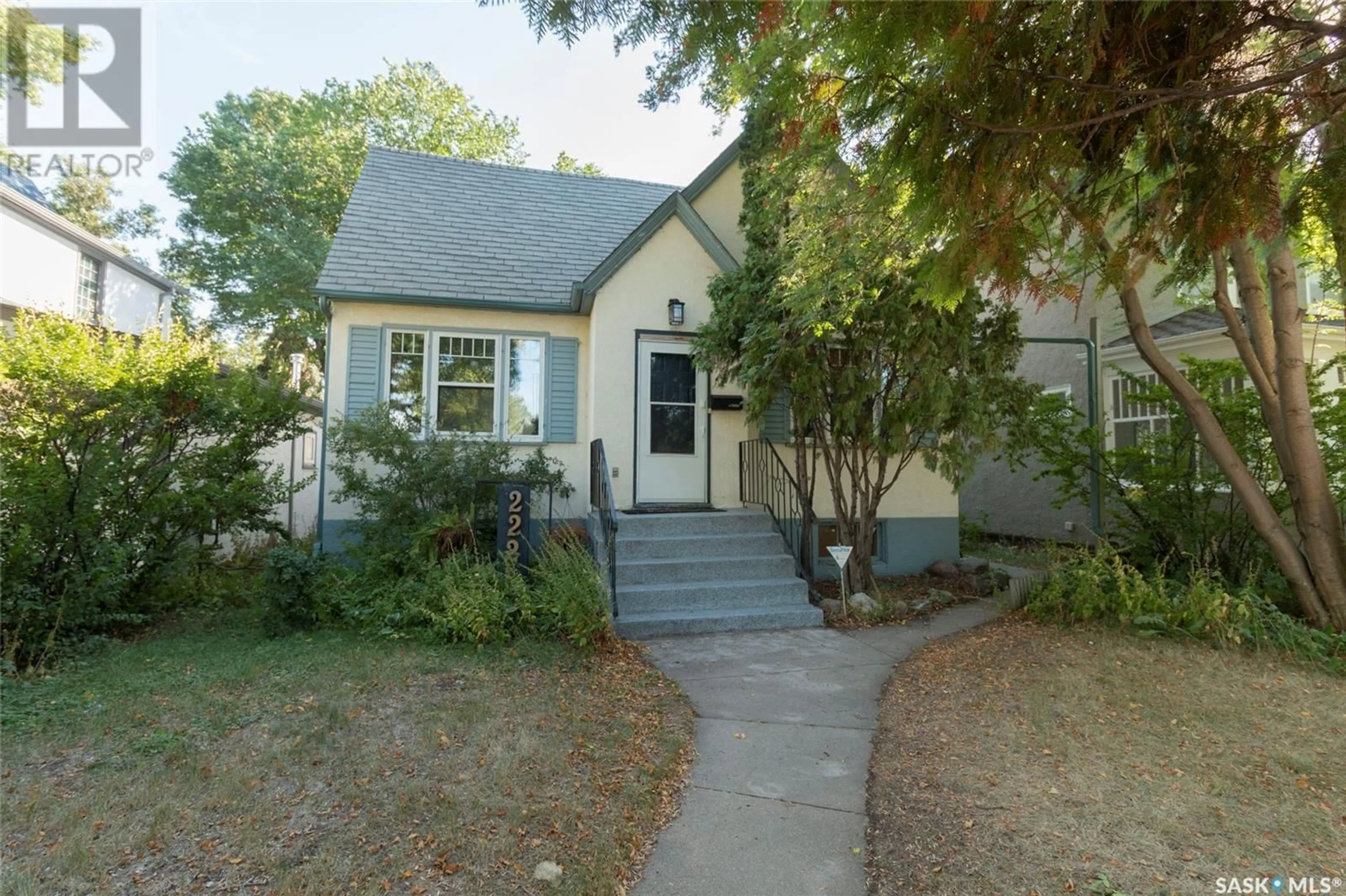 Home with vinyl exterior material, street for 222 8TH STREET, Saskatoon Saskatchewan S7H0P3