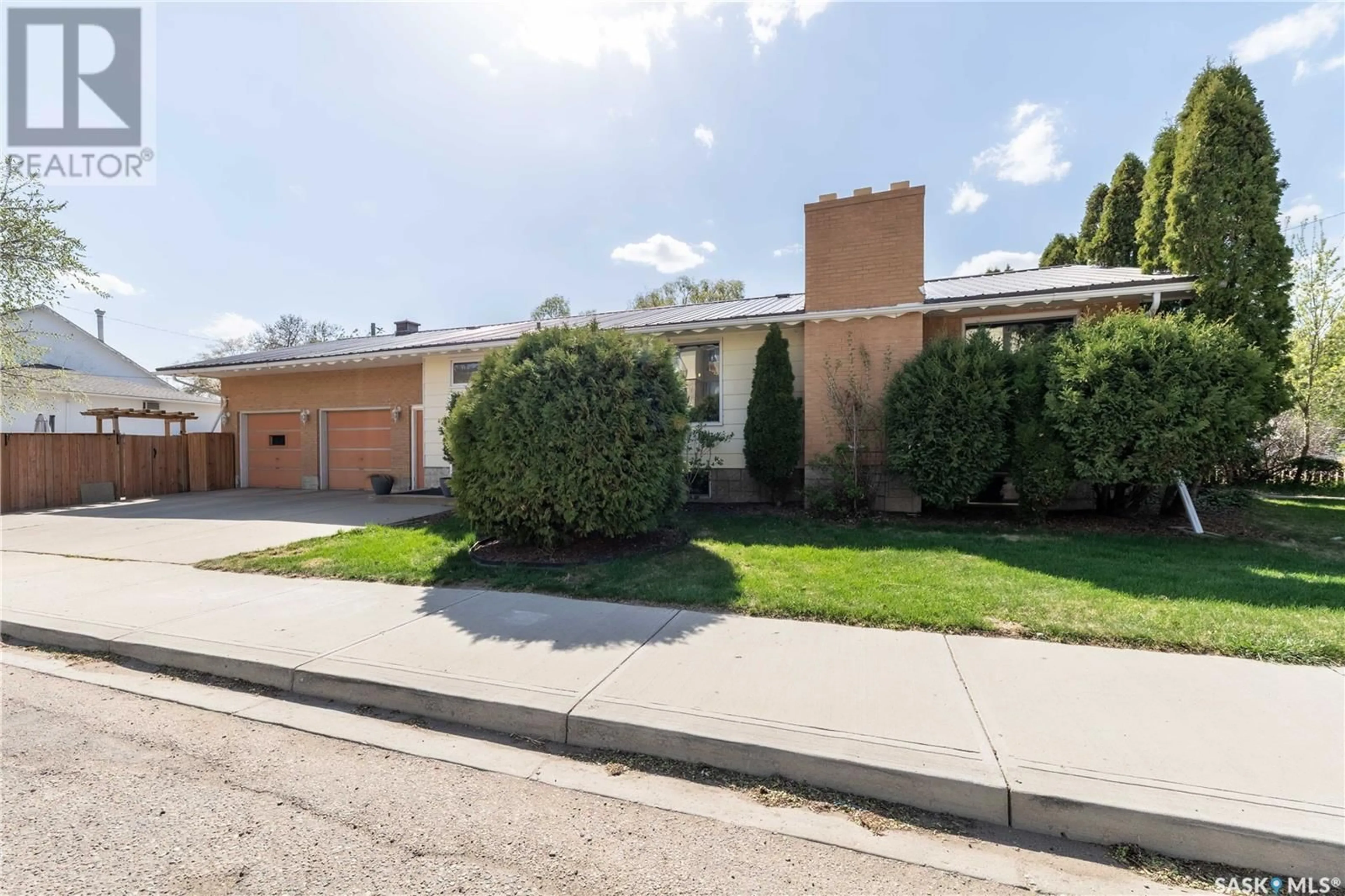 Home with brick exterior material, street for 401 STADACONA STREET, Moose Jaw Saskatchewan S6H1Z7