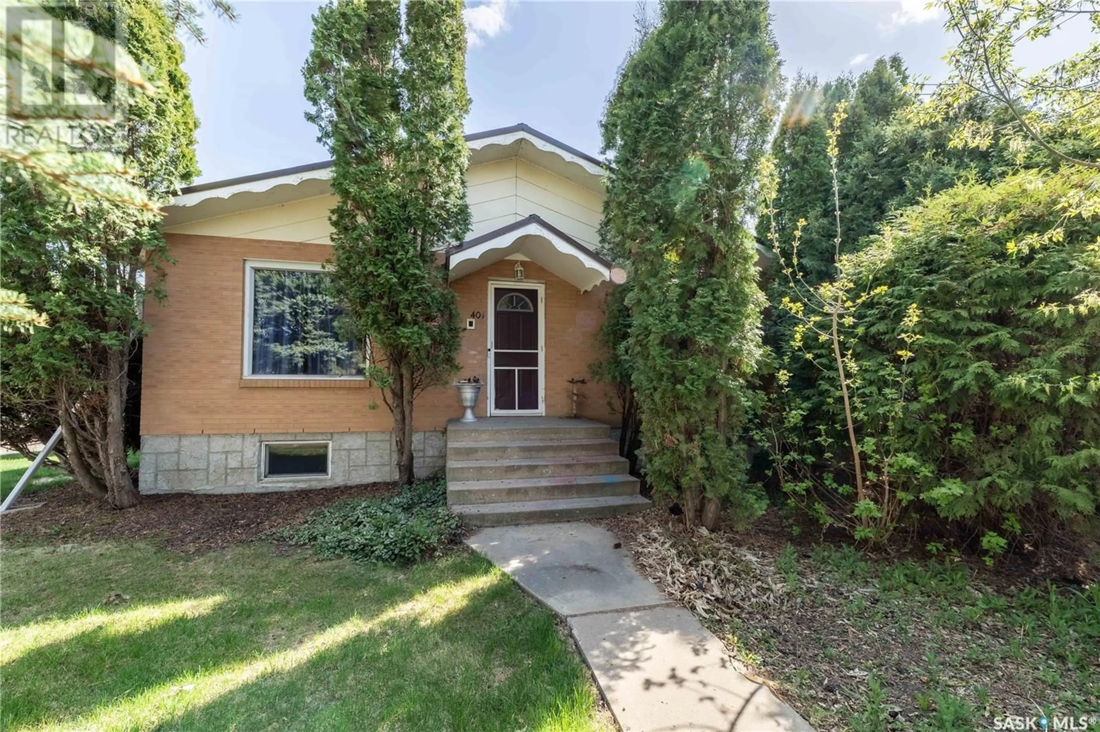 Home with brick exterior material, street for 401 STADACONA STREET, Moose Jaw Saskatchewan S6H1Z7