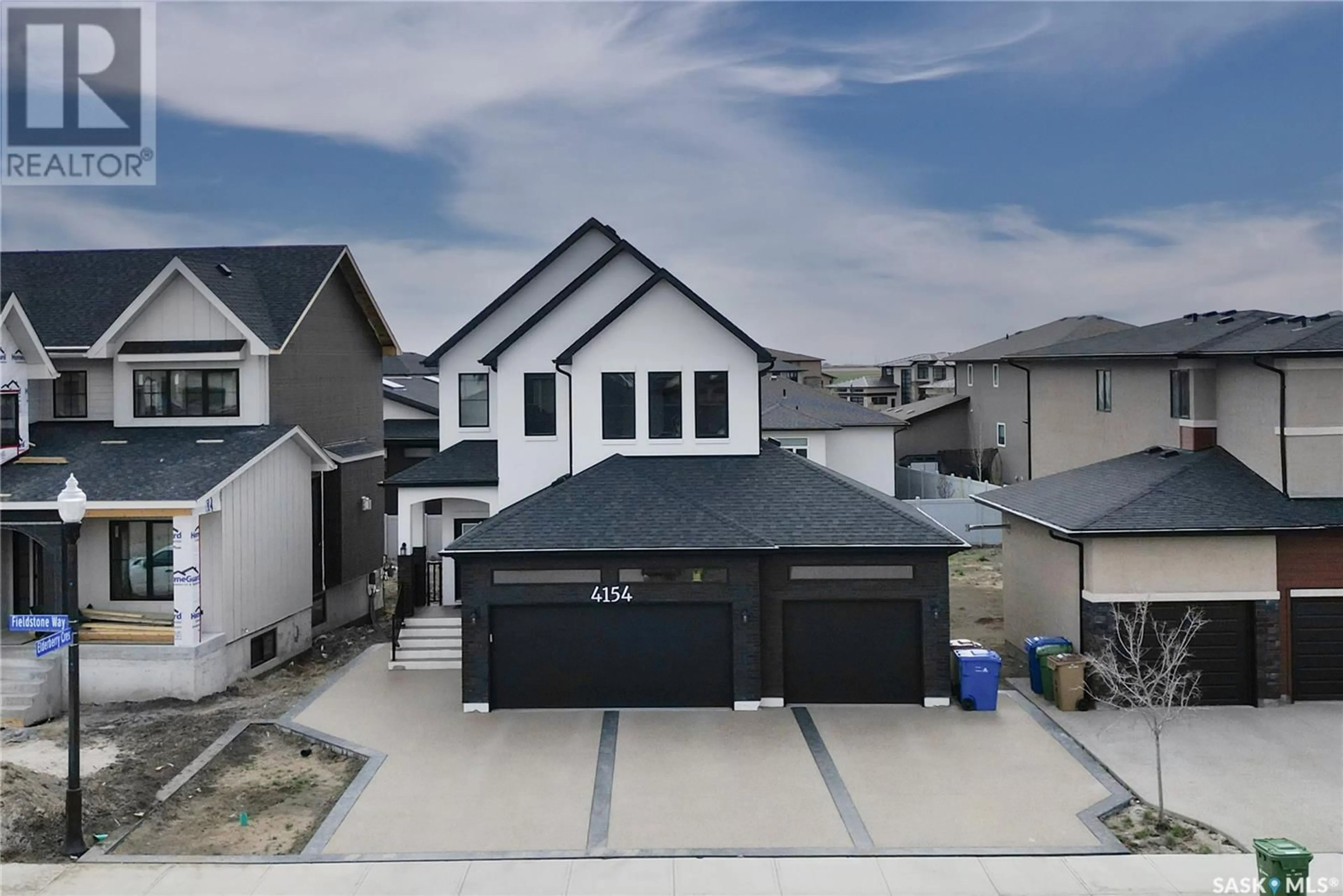 A pic from outside/outdoor area/front of a property/back of a property/a pic from drone, street for 4154 FIELDSTONE WAY, Regina Saskatchewan S4V3V3