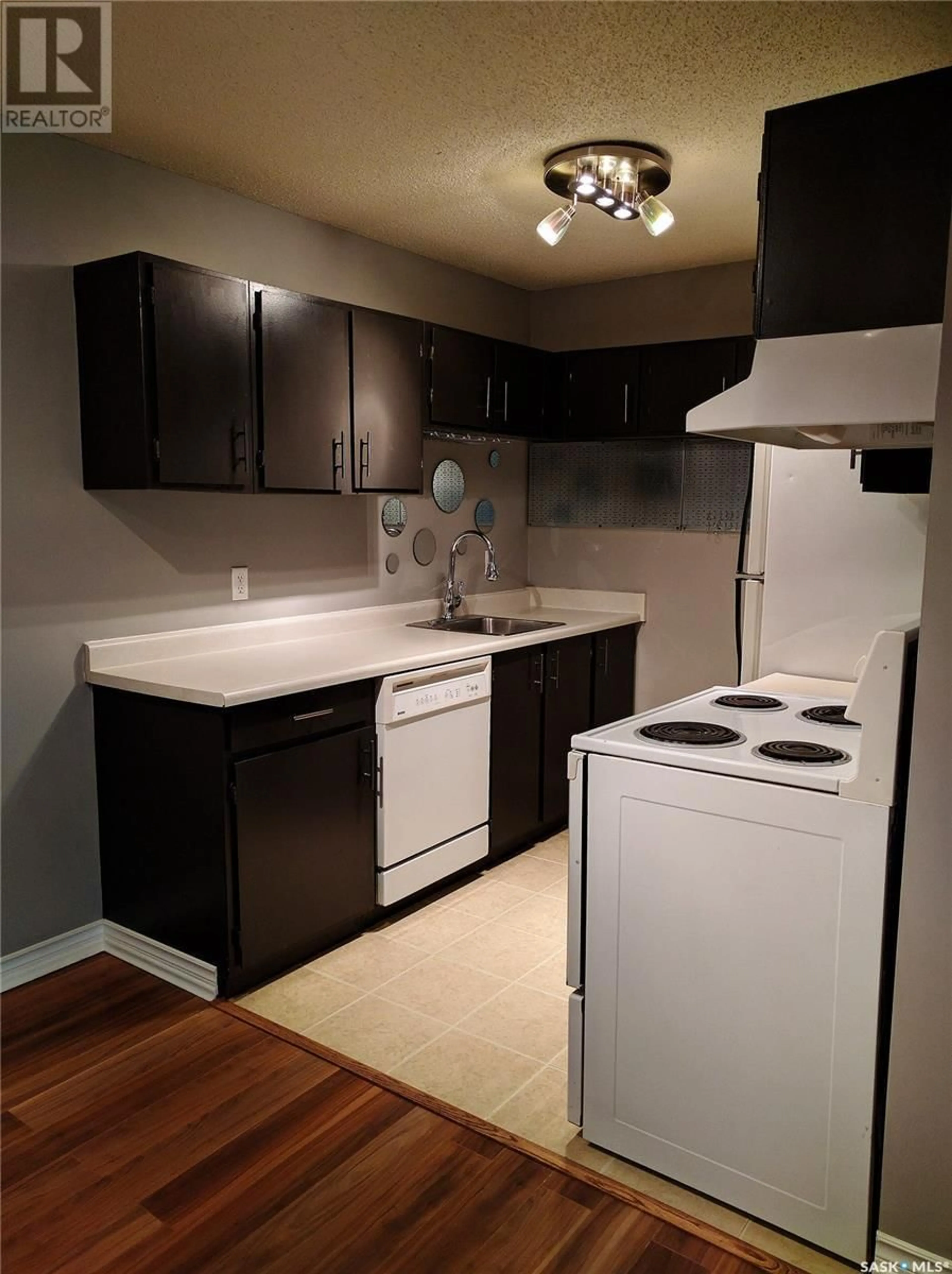 Standard kitchen, wood/laminate floor for 309 311 TAIT CRESCENT, Saskatoon Saskatchewan S7H5L6