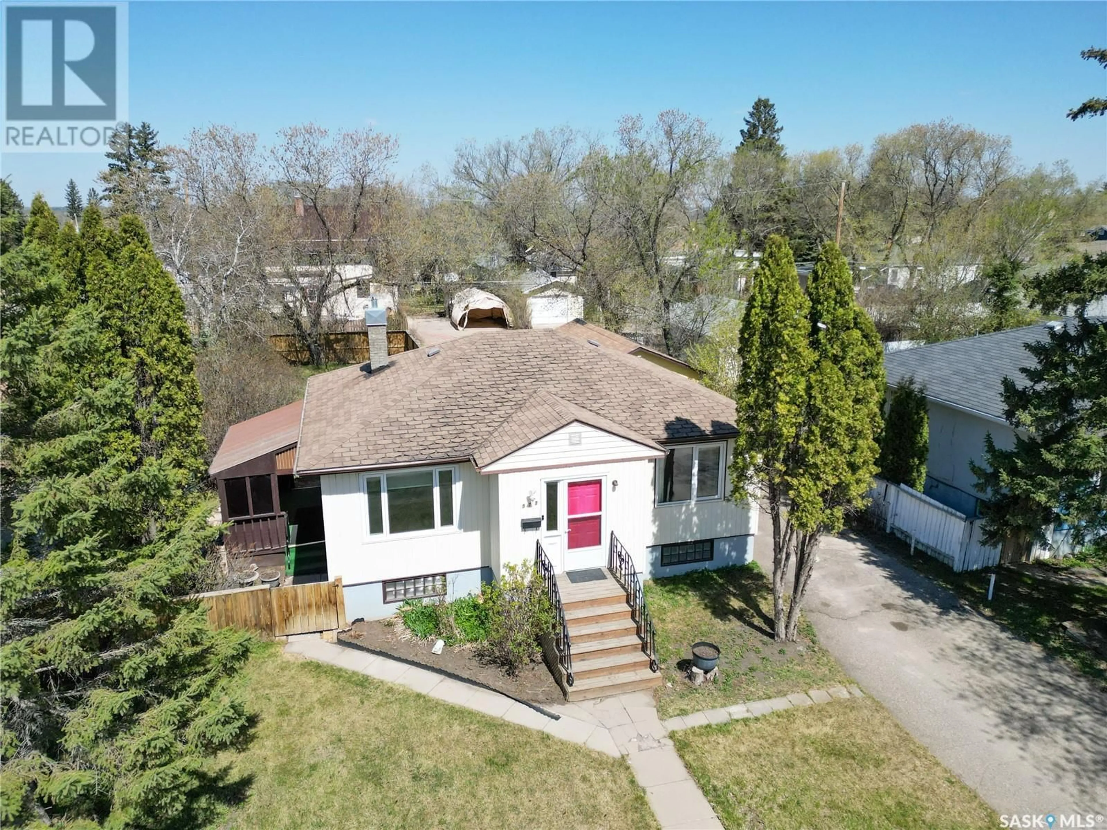 A pic from outside/outdoor area/front of a property/back of a property/a pic from drone, street for 372 22ND STREET, Prince Albert Saskatchewan S6V4K4