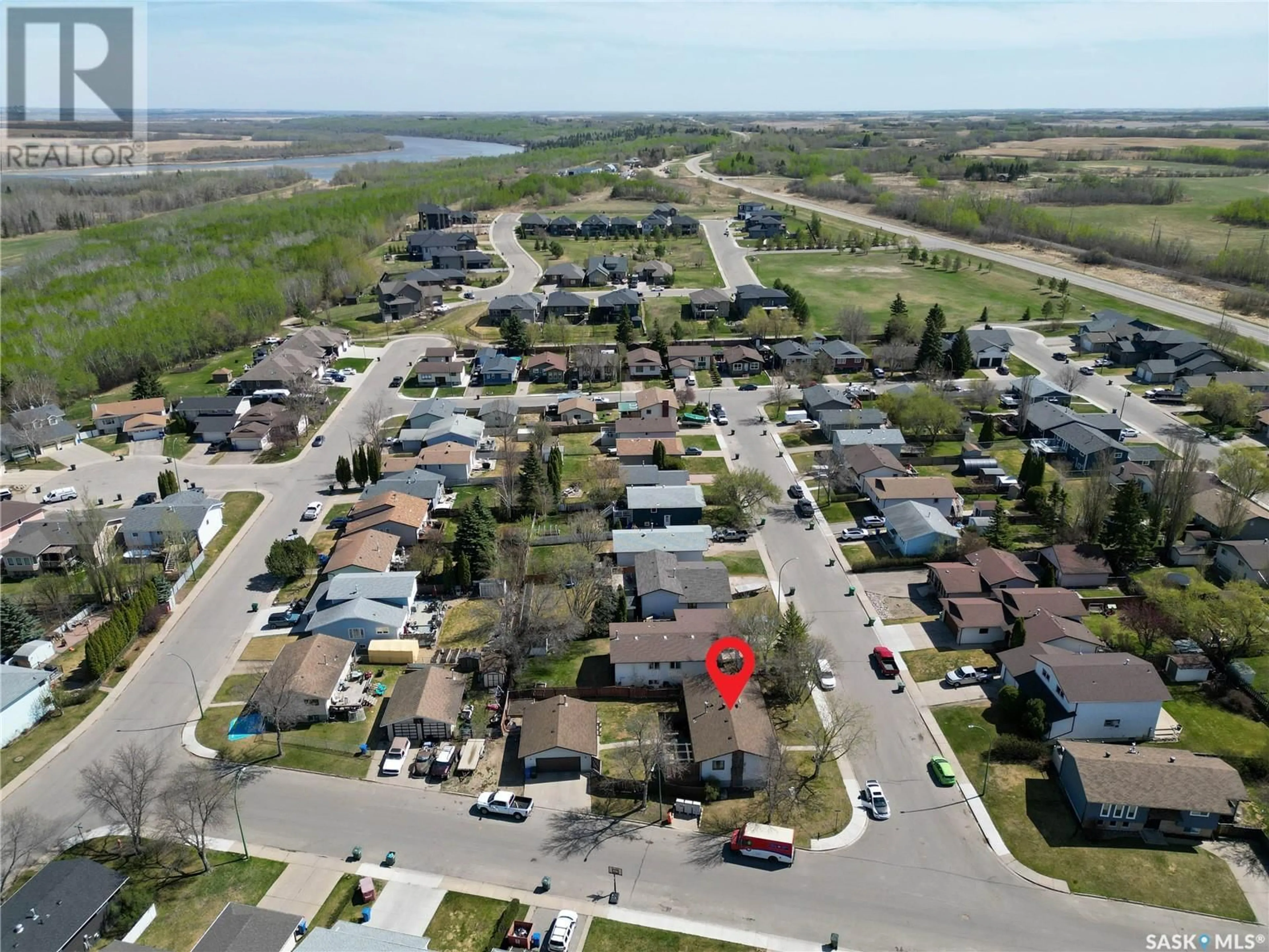 A pic from outside/outdoor area/front of a property/back of a property/a pic from drone, street for 1722 DAISLEY ROAD, Prince Albert Saskatchewan S6V7E4