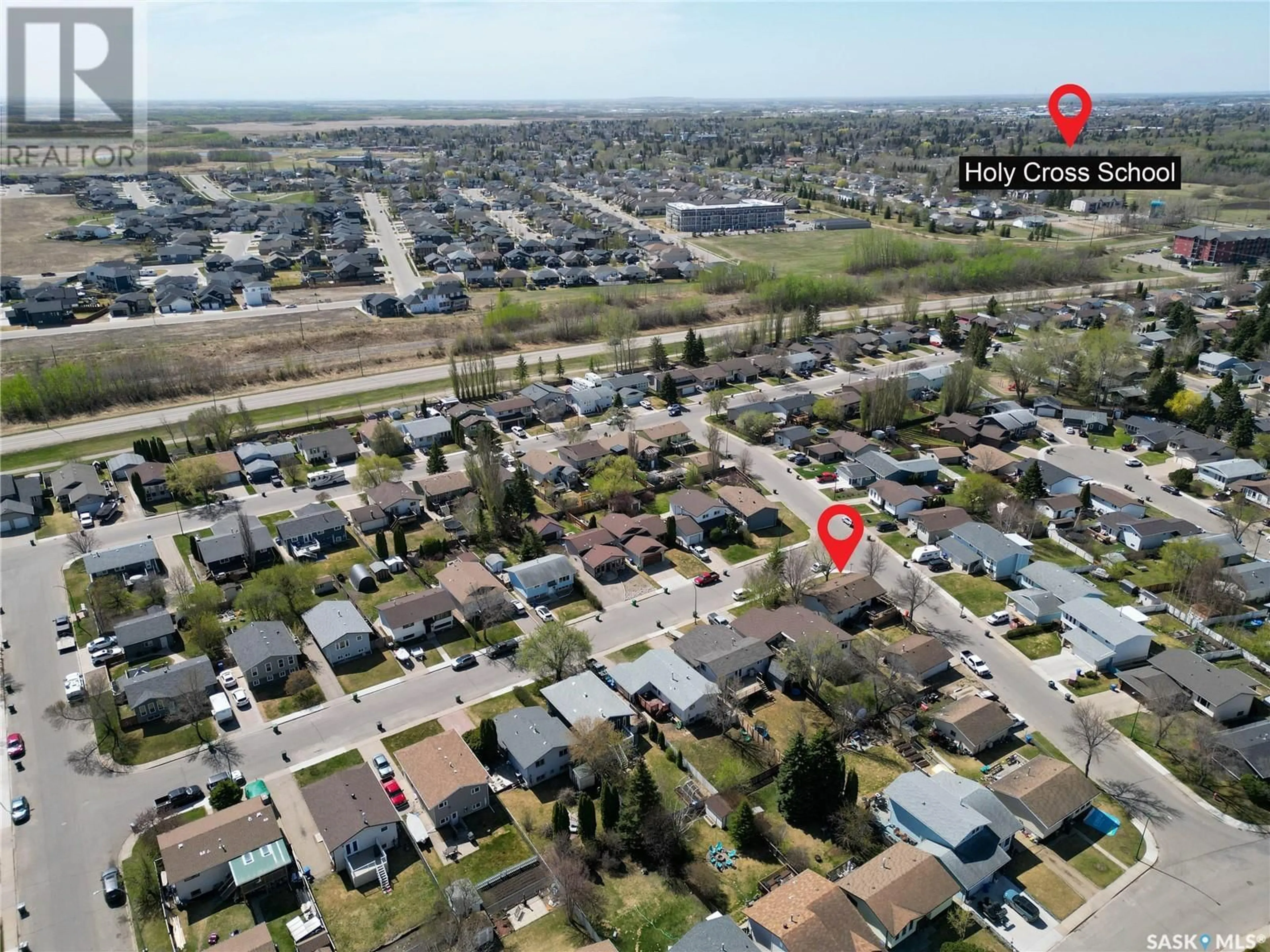 A pic from outside/outdoor area/front of a property/back of a property/a pic from drone, street for 1722 DAISLEY ROAD, Prince Albert Saskatchewan S6V7E4