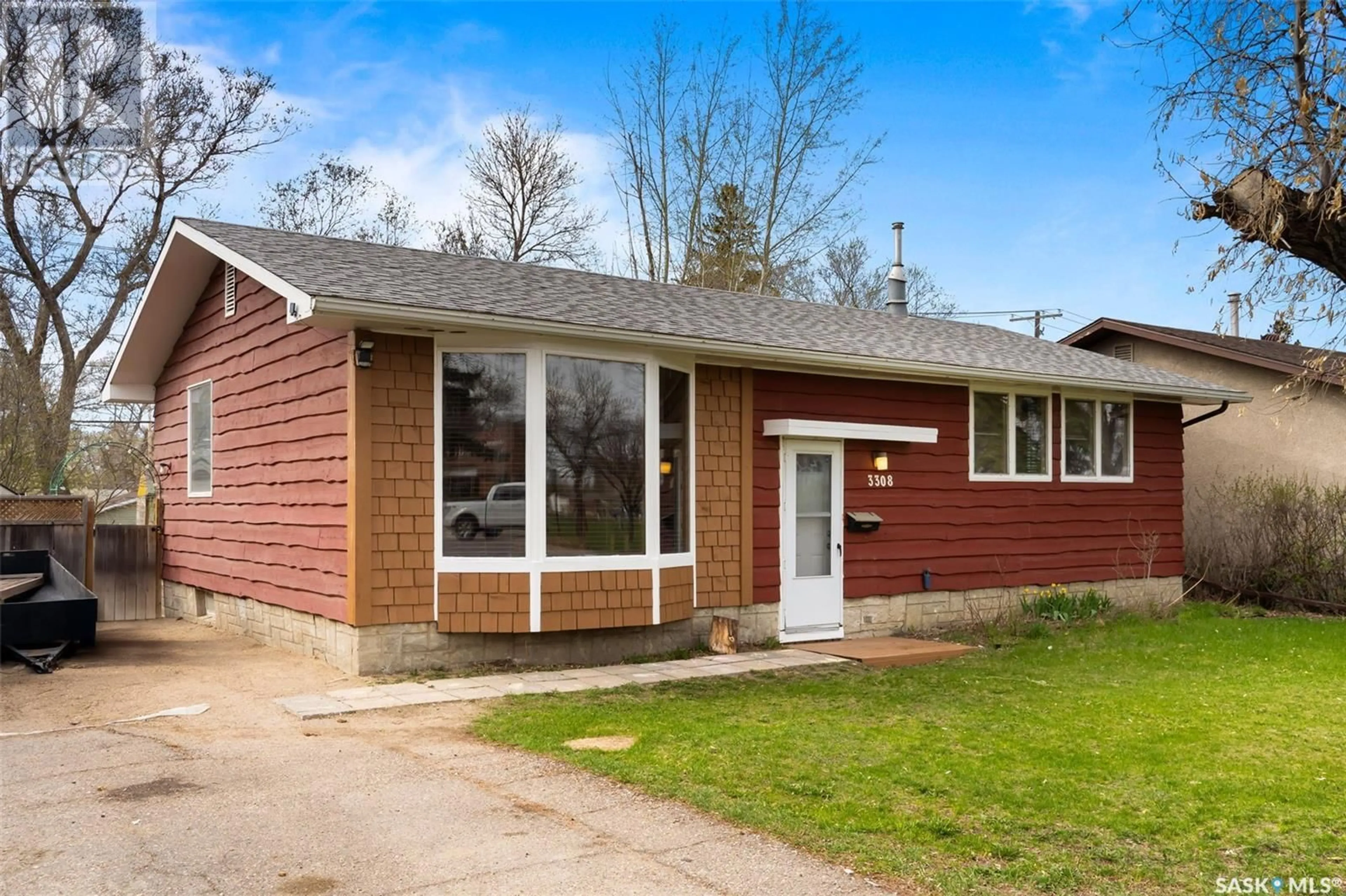 Home with vinyl exterior material, street for 3308 GRANT ROAD, Regina Saskatchewan S4S5H5