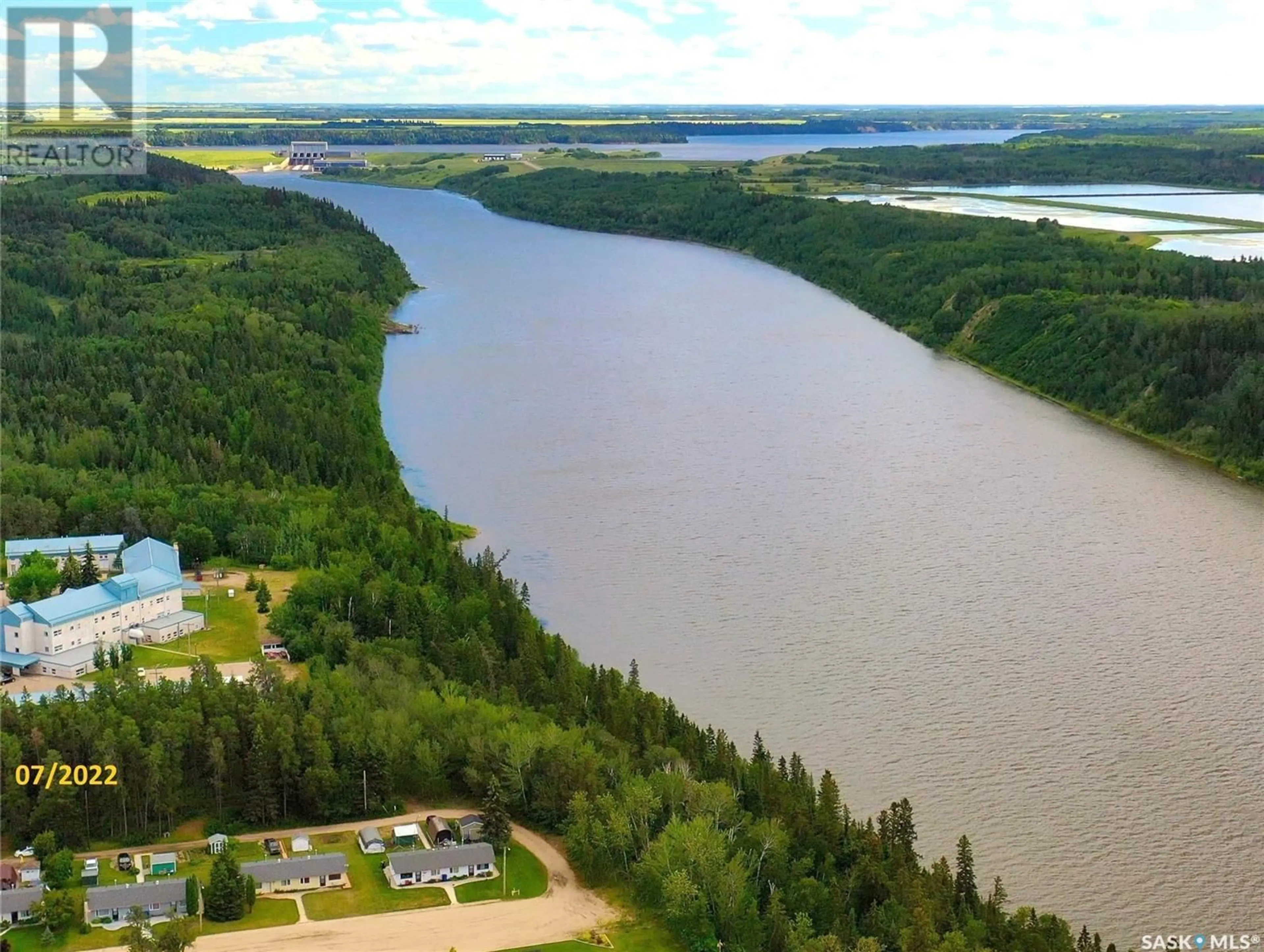 A pic from outside/outdoor area/front of a property/back of a property/a pic from drone, water/lake/river/ocean view for 102 - 306 102 MANOR DRIVE, Nipawin Saskatchewan S0E1E0
