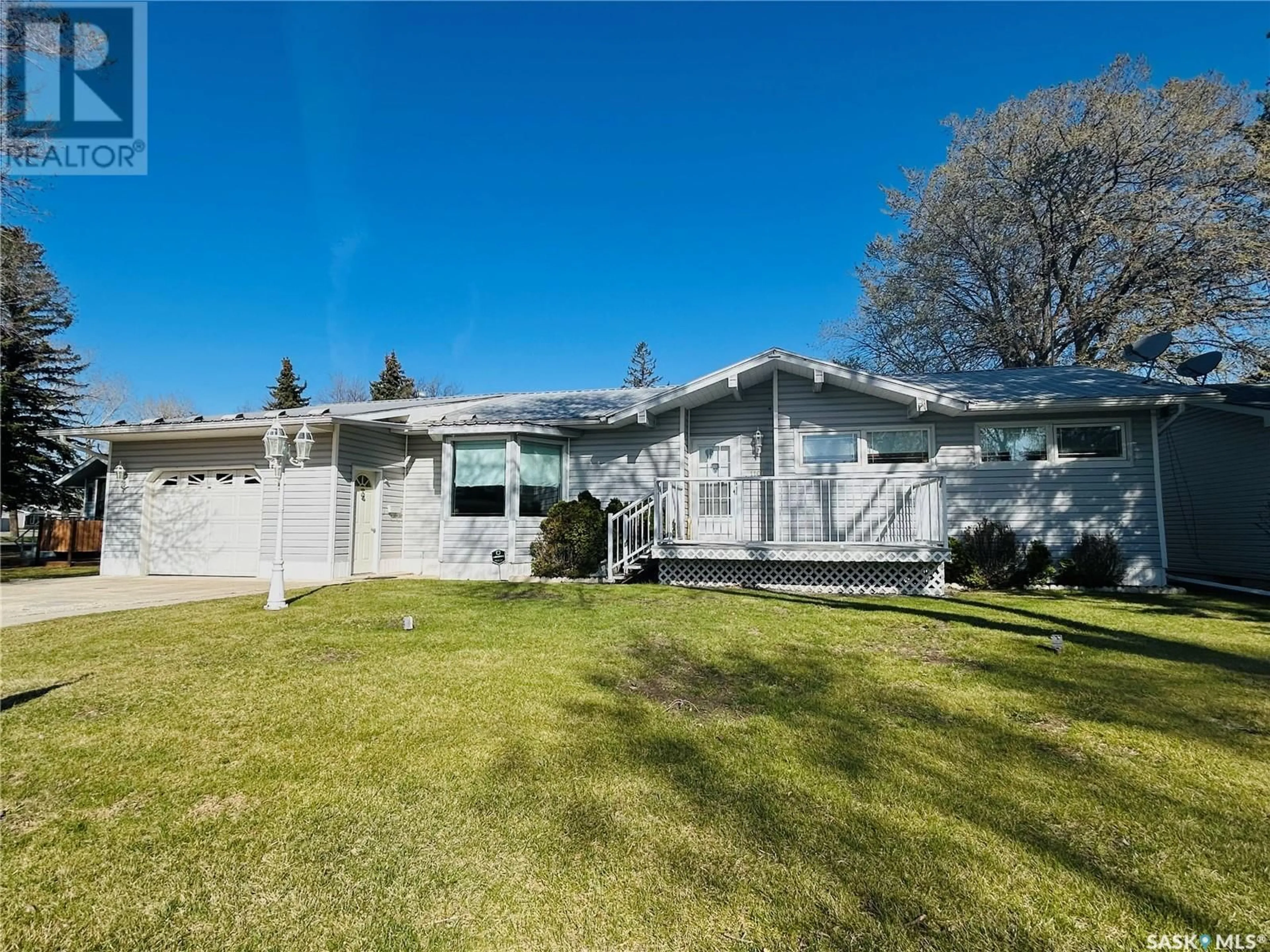 Home with vinyl exterior material, street for 1106 MOUNTAIN STREET, Moosomin Saskatchewan S0G3N0
