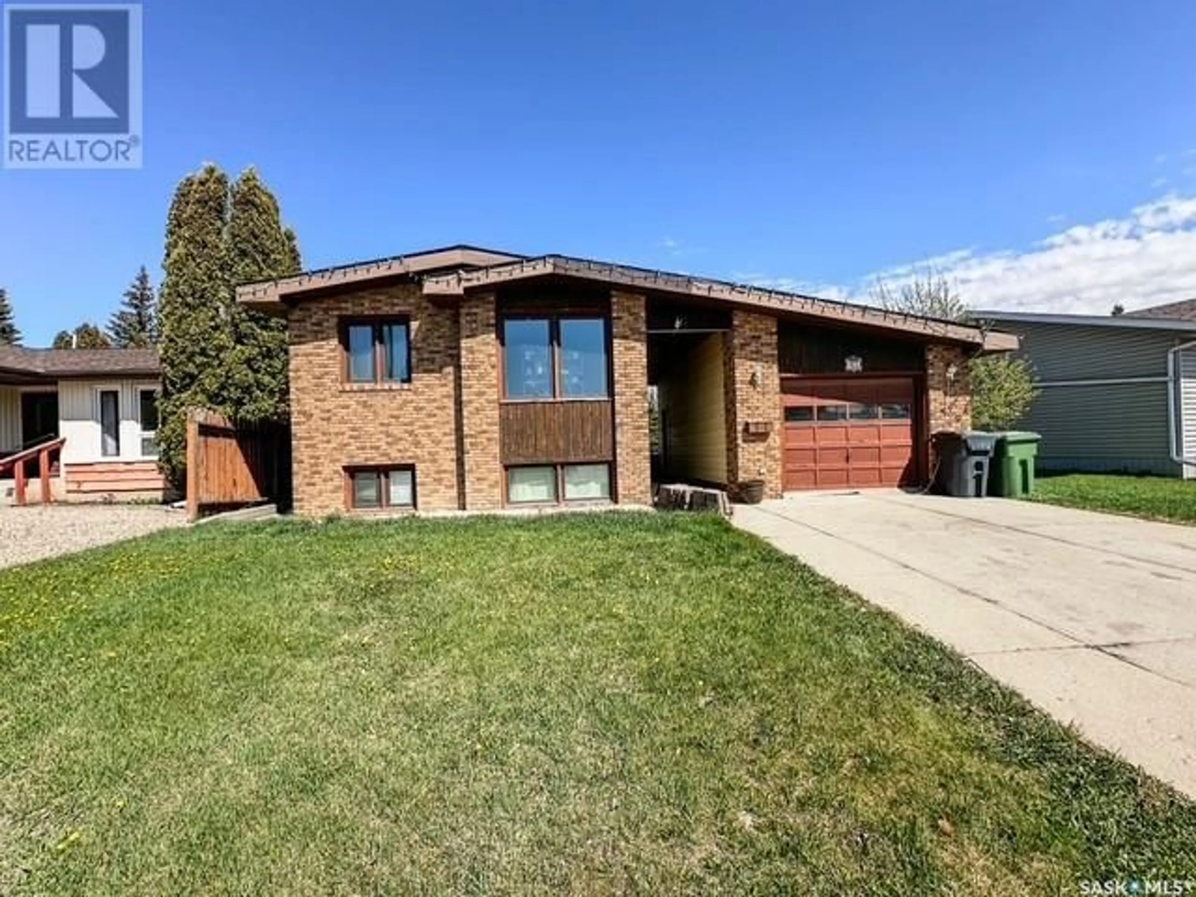Home with brick exterior material, street for 23 MORRISON DRIVE, Yorkton Saskatchewan S3N3N5