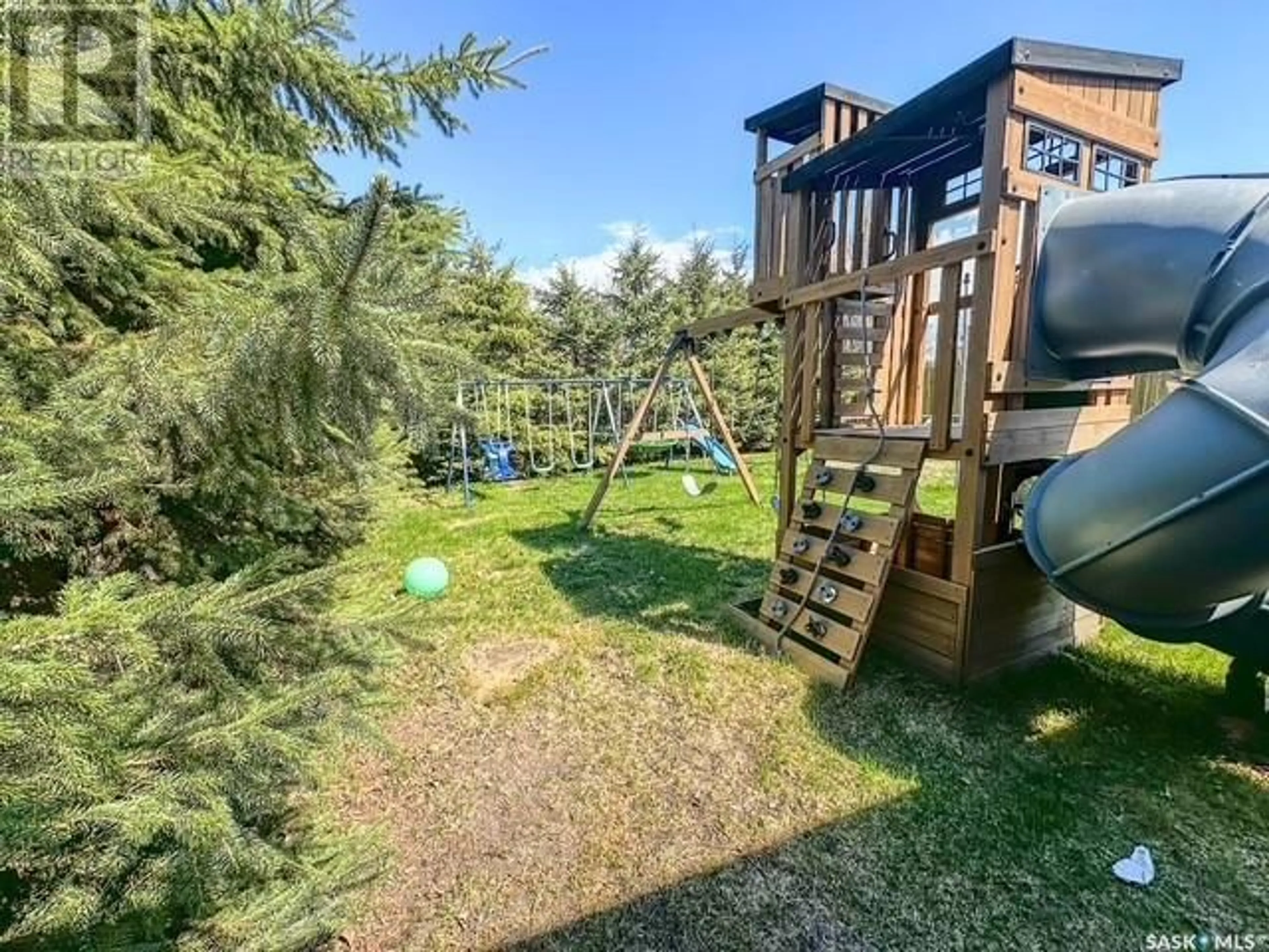 A pic from outside/outdoor area/front of a property/back of a property/a pic from drone, forest/trees view for 23 MORRISON DRIVE, Yorkton Saskatchewan S3N3N5
